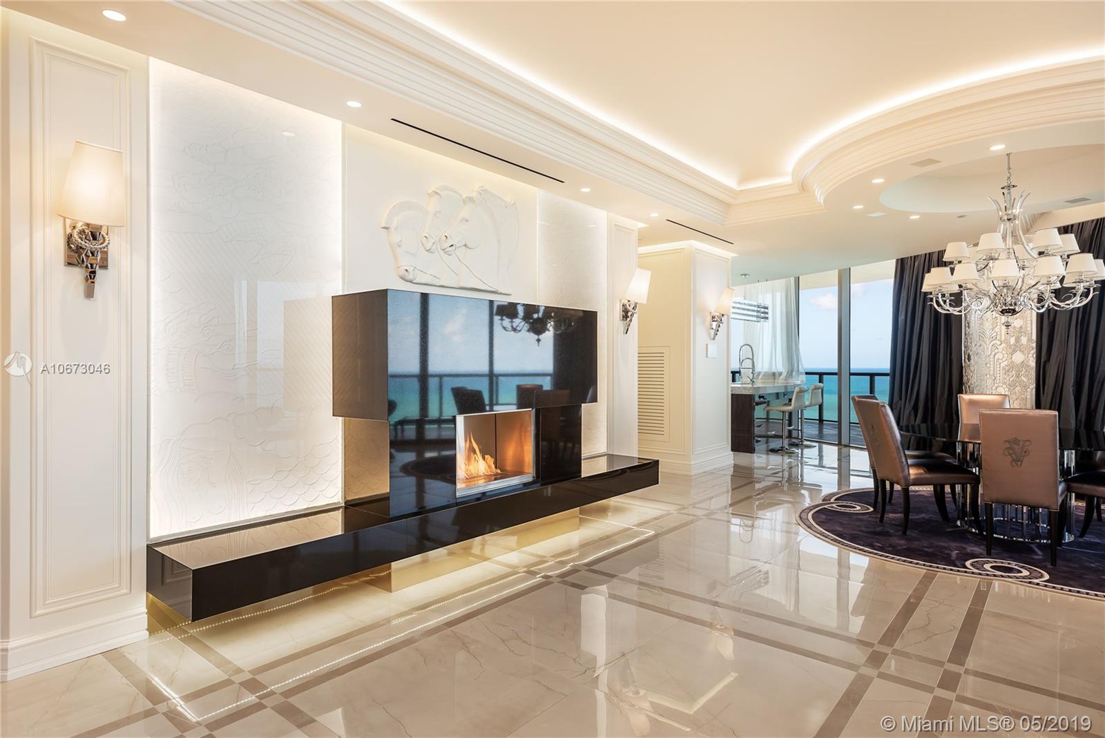 Luxury condo dining area with ocean view at St. Regis Bal Harbour, Miami
