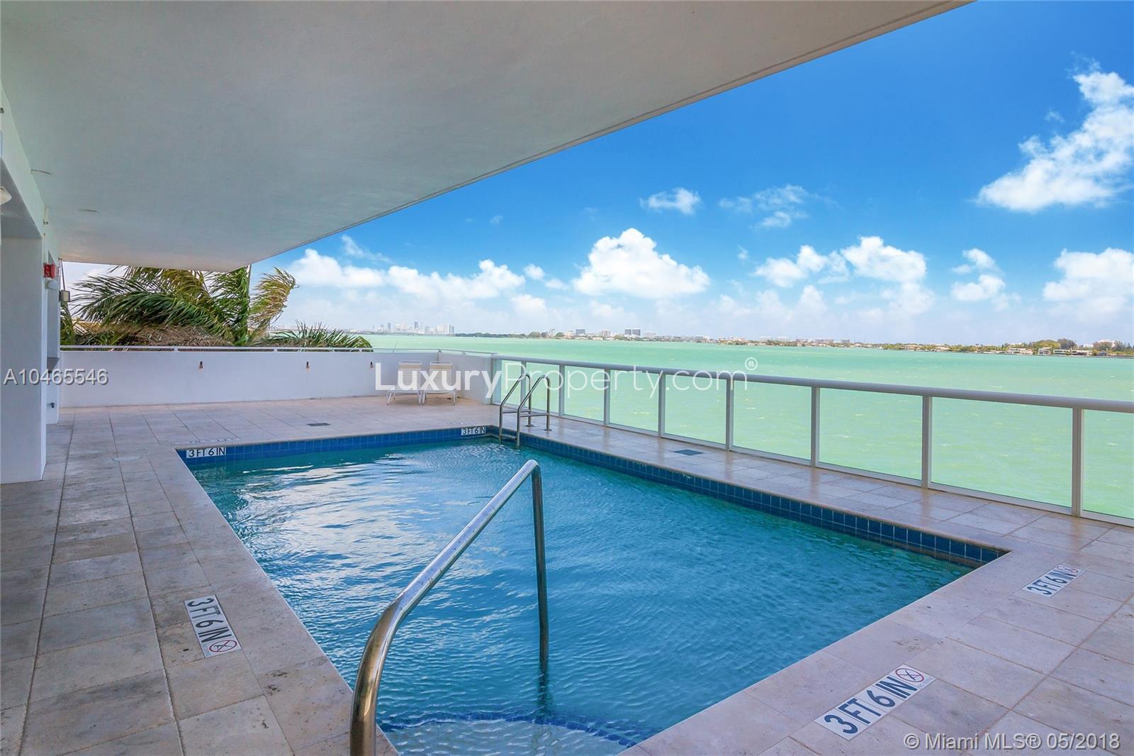 Modern waterfront condo with pool in North Bay Village, Miami, for sale