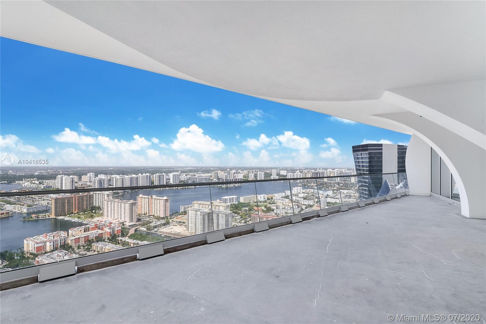Luxurious Miami penthouse interior with ocean view, large windows, modern design