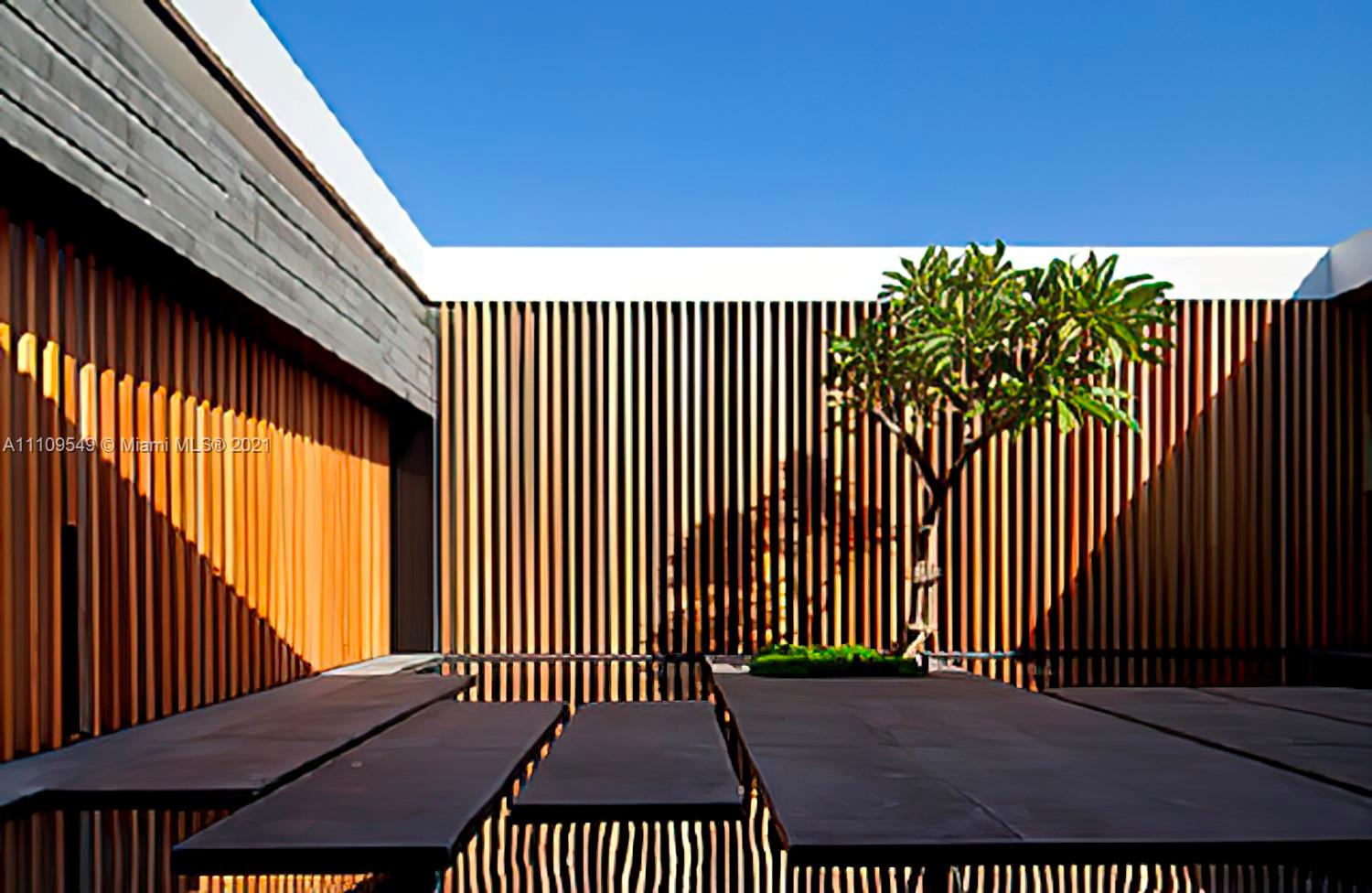 Modern wooden entryway with glass accents in Miami villa for sale, LP10113