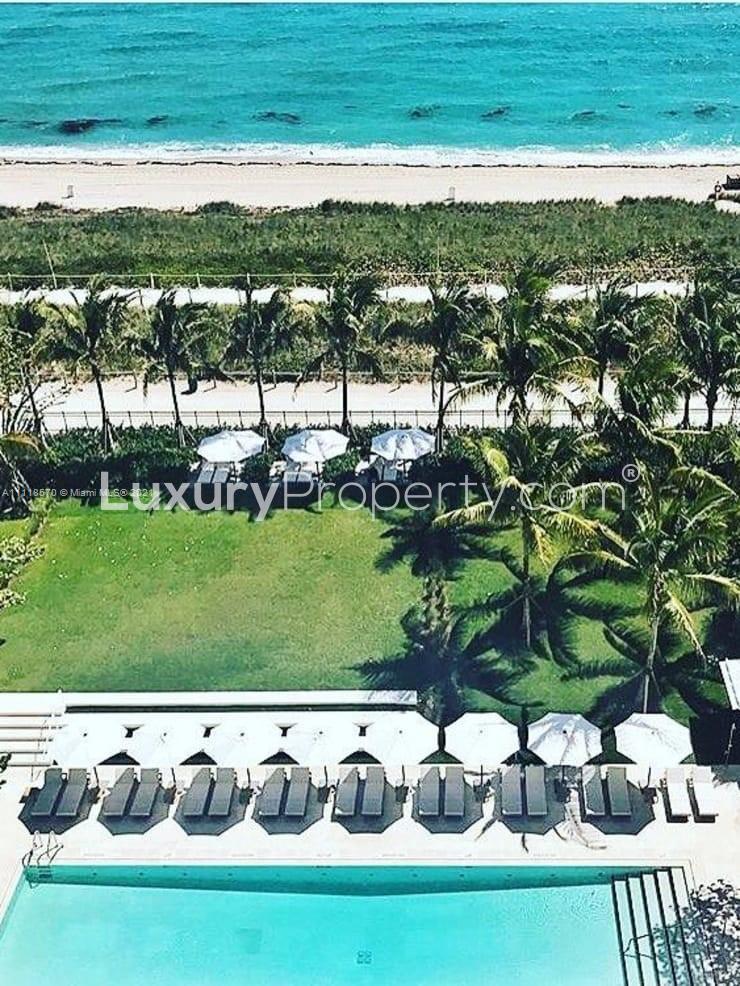 "Stylish bicycles at Four Seasons Surf Club villa, Surfside, Florida, oceanfront property for sale.",Luxurious oceanfront villa with private pool and beach view at Surfside, Florida