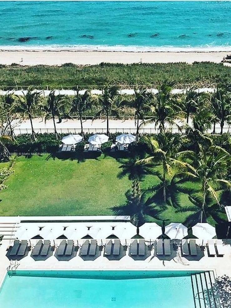 "Stylish bicycles at Four Seasons Surf Club villa, Surfside, Florida, oceanfront property for sale.",Luxurious oceanfront villa with private pool and beach view at Surfside, Florida