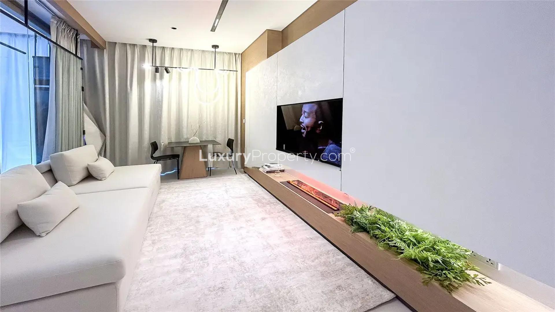 Studio apartment living area with modern decor in Marquise Square Tower, Business Bay