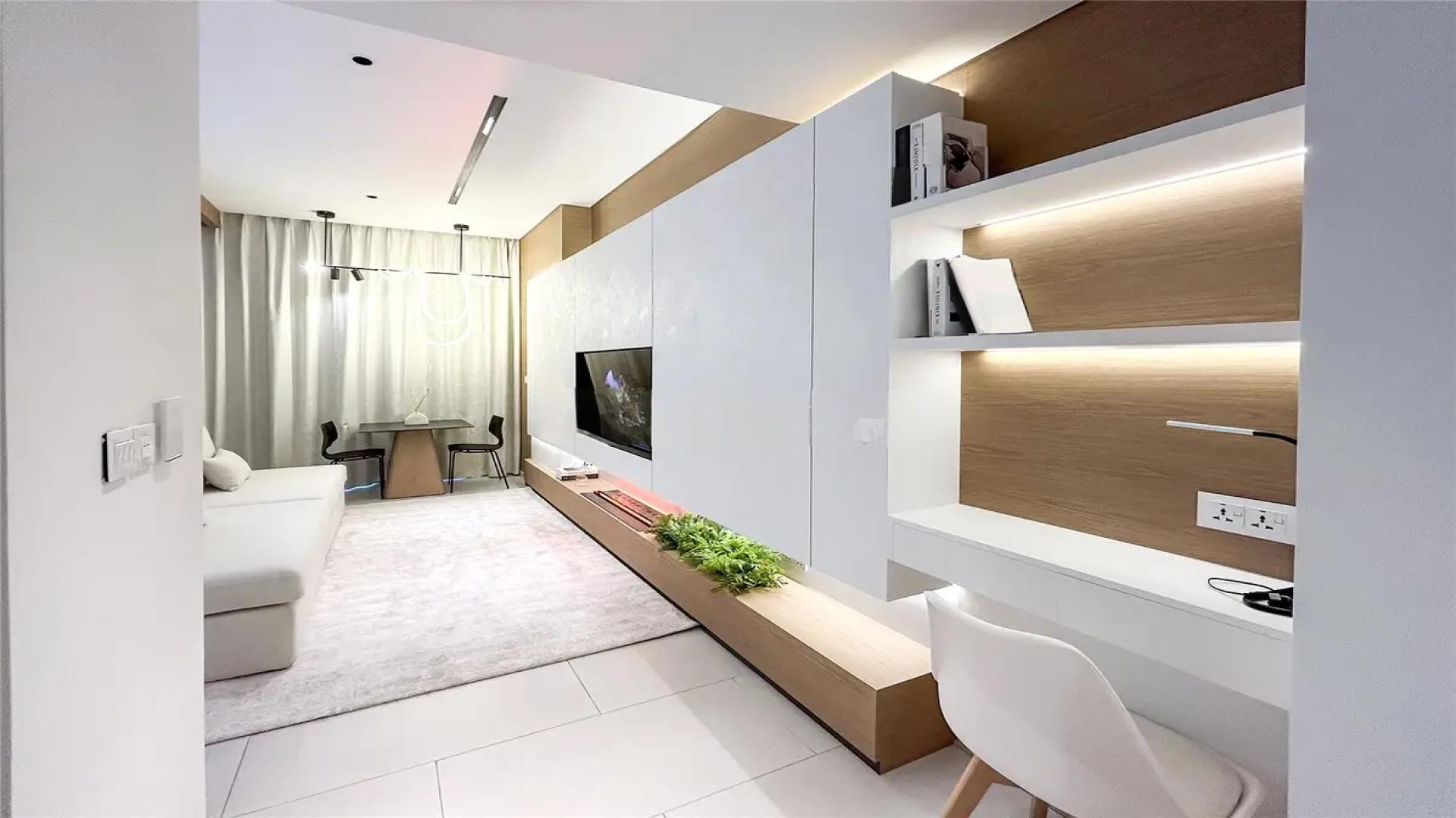 Studio apartment living area in Marquise Square Tower, Business Bay, with modern decor