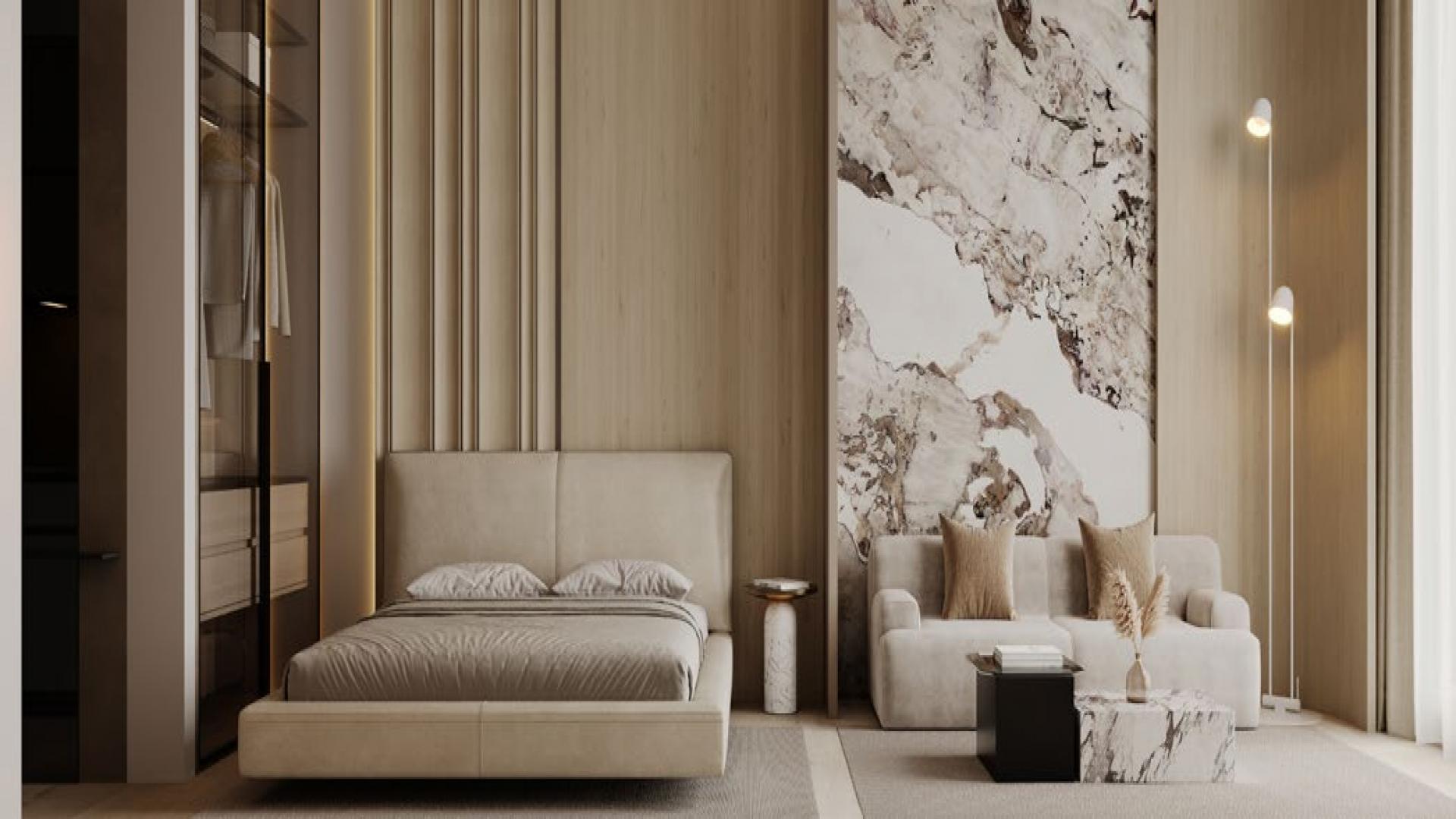 Modern interior of Binghatti Hills studio apartment with stylish decor and fireplace in Dubai