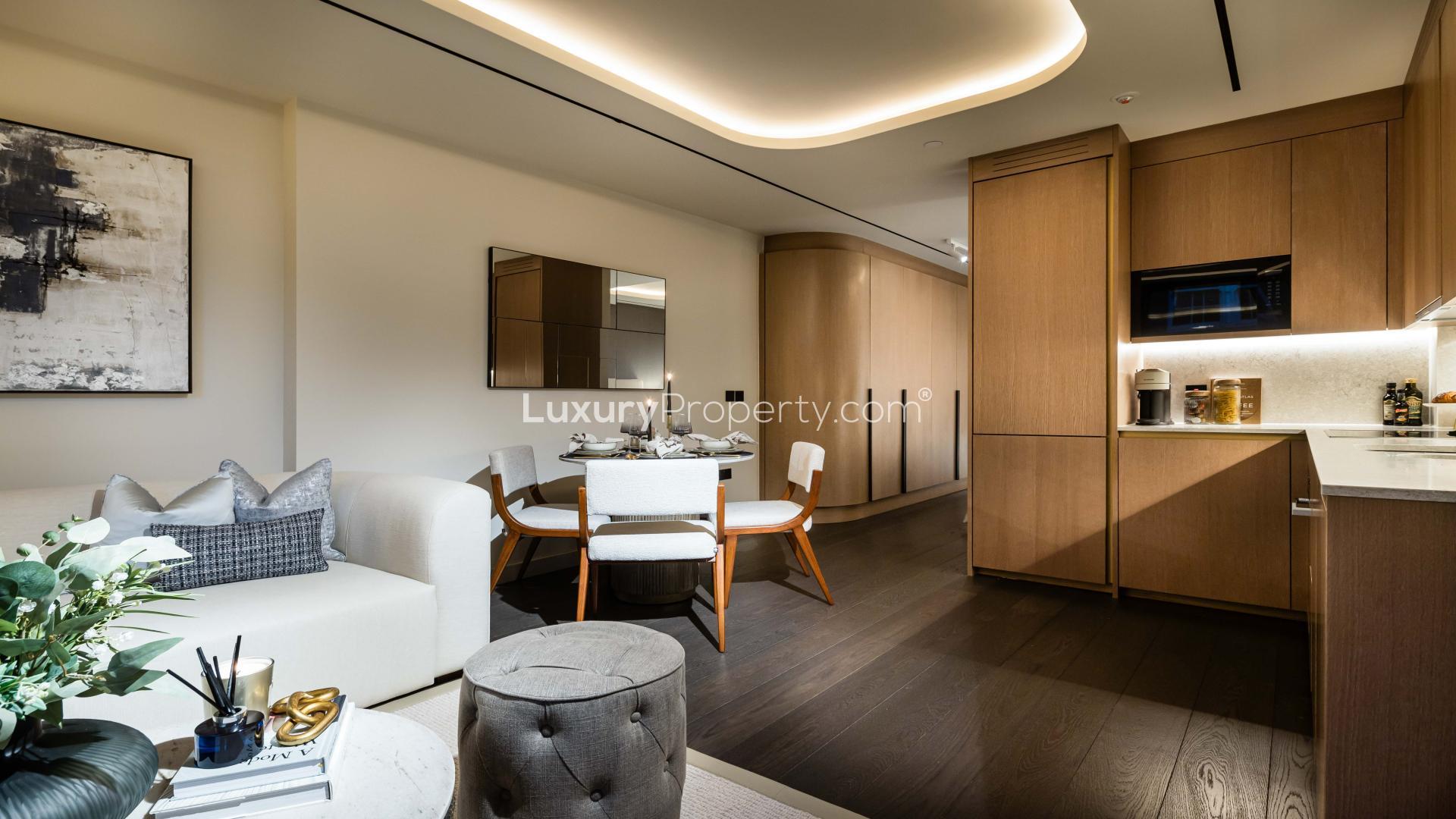Modern living area in TCRW Soho studio apartment, elegant decor with stylish furnishings