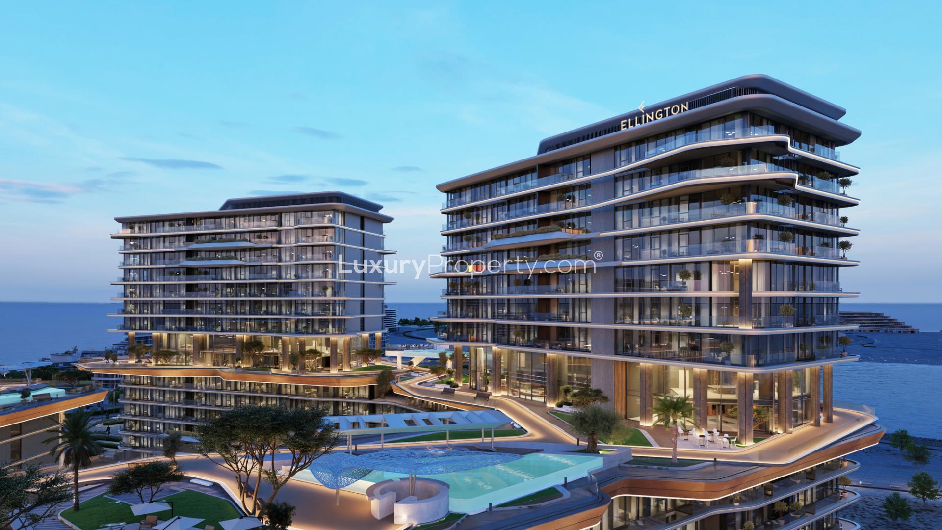 Aerial view of Costa Mare apartments on Al Marjan Island beachfront, lush surroundings