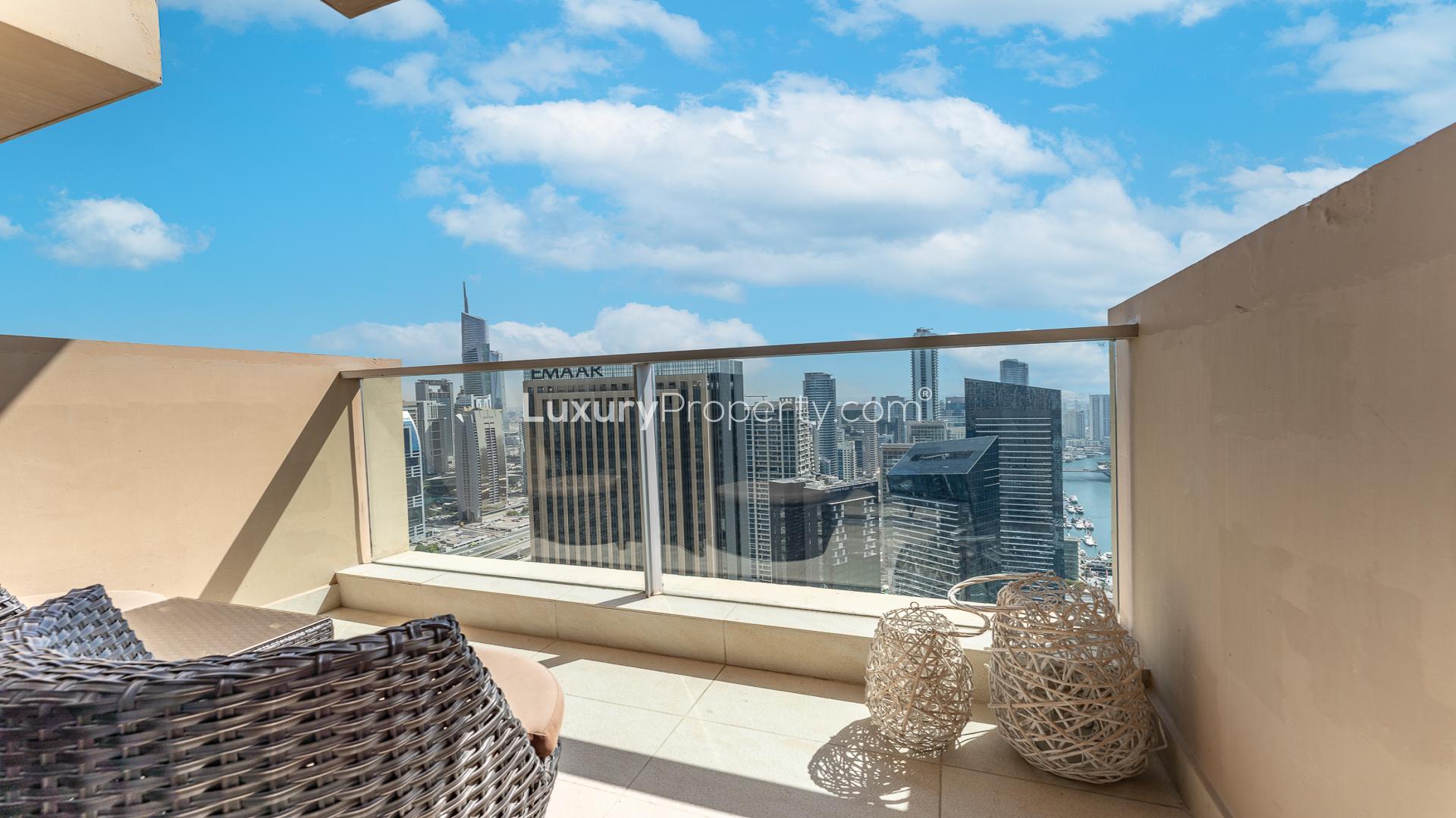 Fully furnished studio apartment bedroom in JW Marriott, Dubai Marina, with modern decor