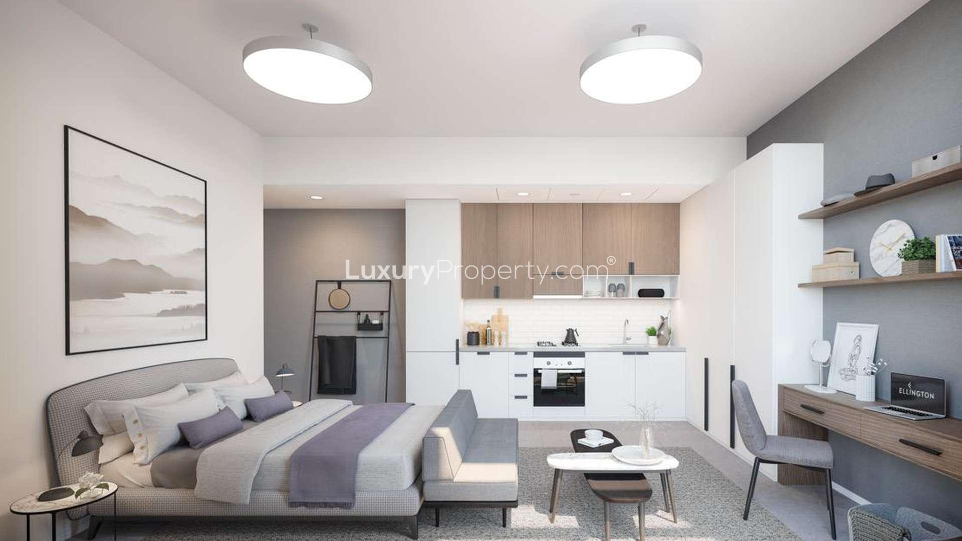 Luxurious living room in Belgravia Heights II apartment, JVC, with elegant decor and garden view