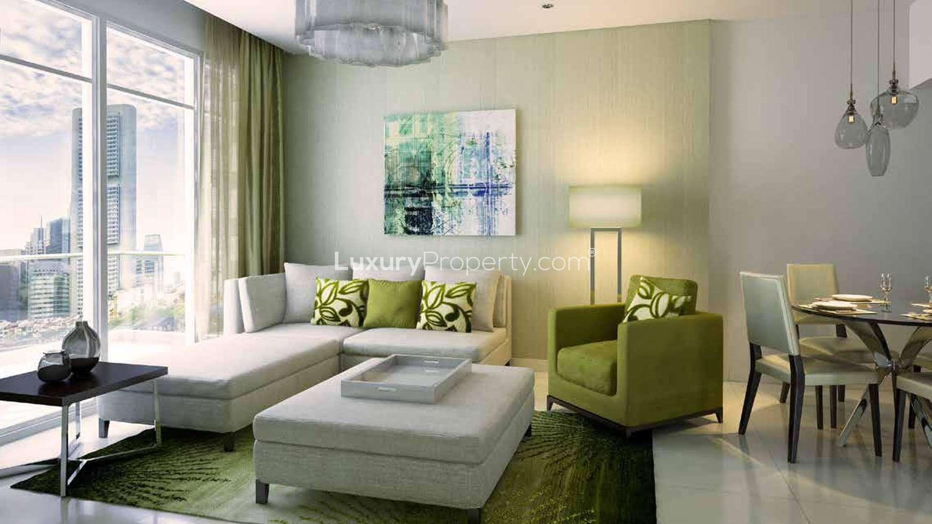 Luxurious lobby in Celestia, Dubai South apartment for sale, featuring modern red seating