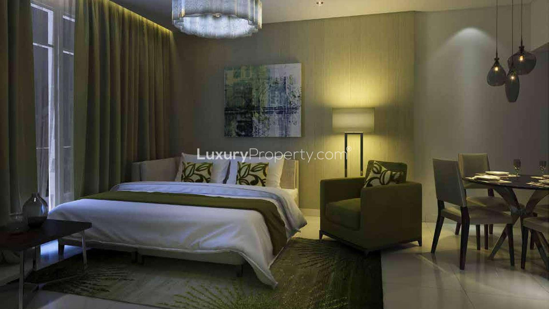 Studio apartment living area with modern decor in Celestia, Dubai South