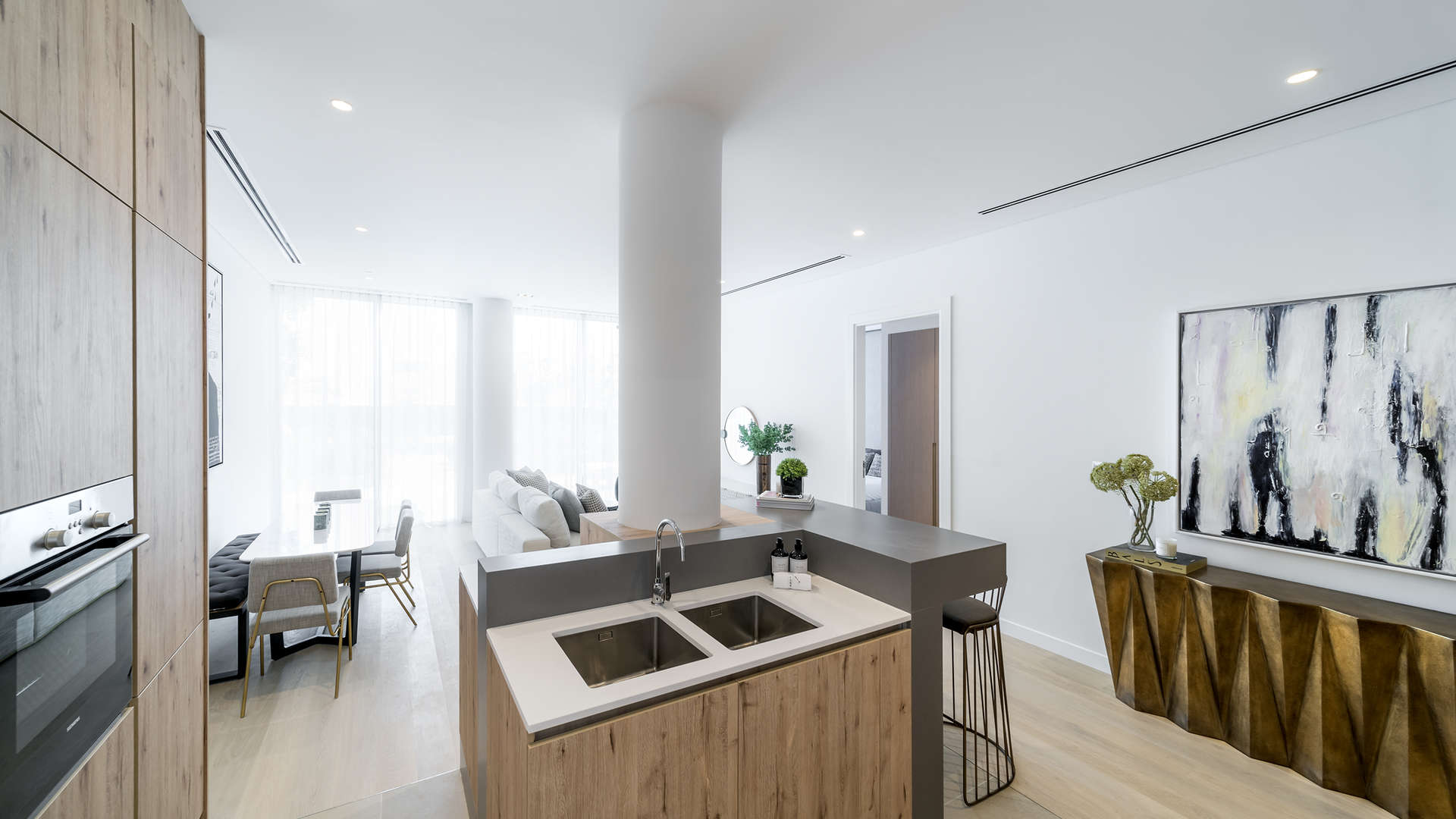 Modern studio apartment kitchen and living area in The Neighbourhood, Al Barari, Dubai