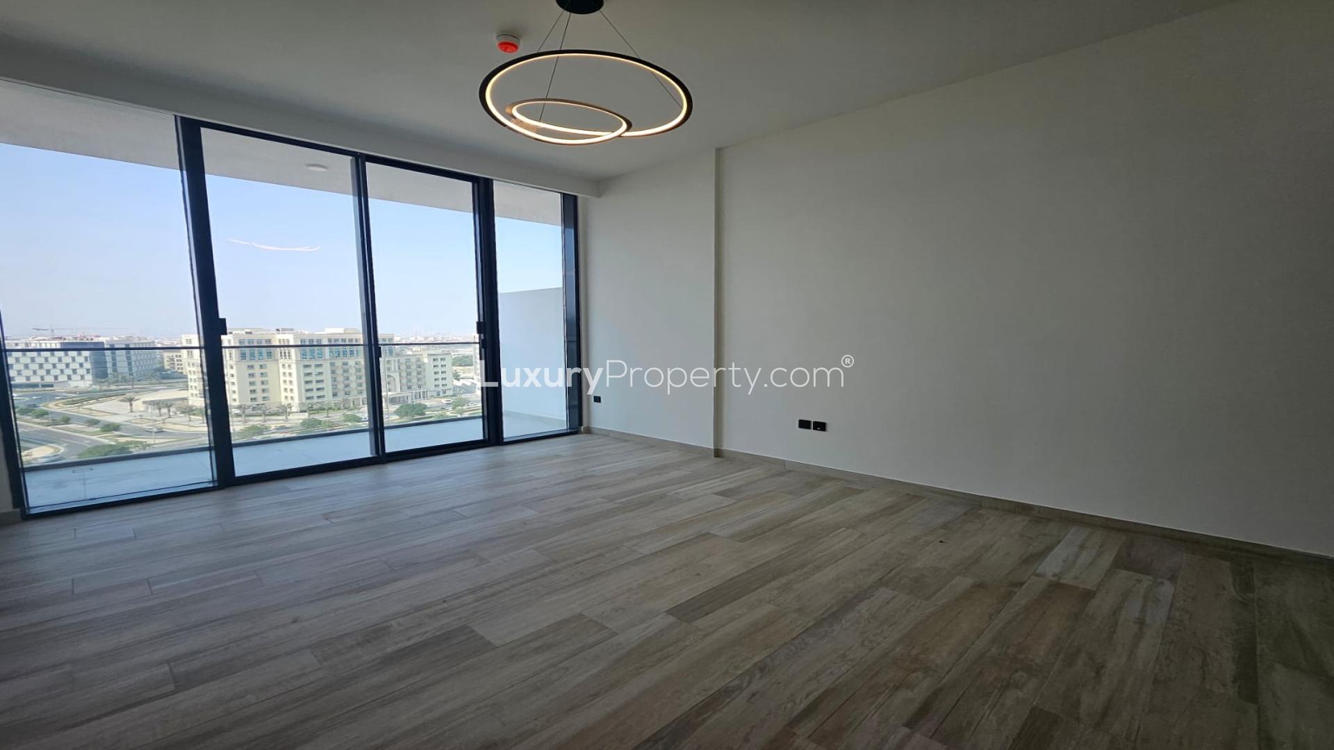 Modern studio apartment interior at Oxford Gardens, Arjan, featuring sleek design and wood flooring