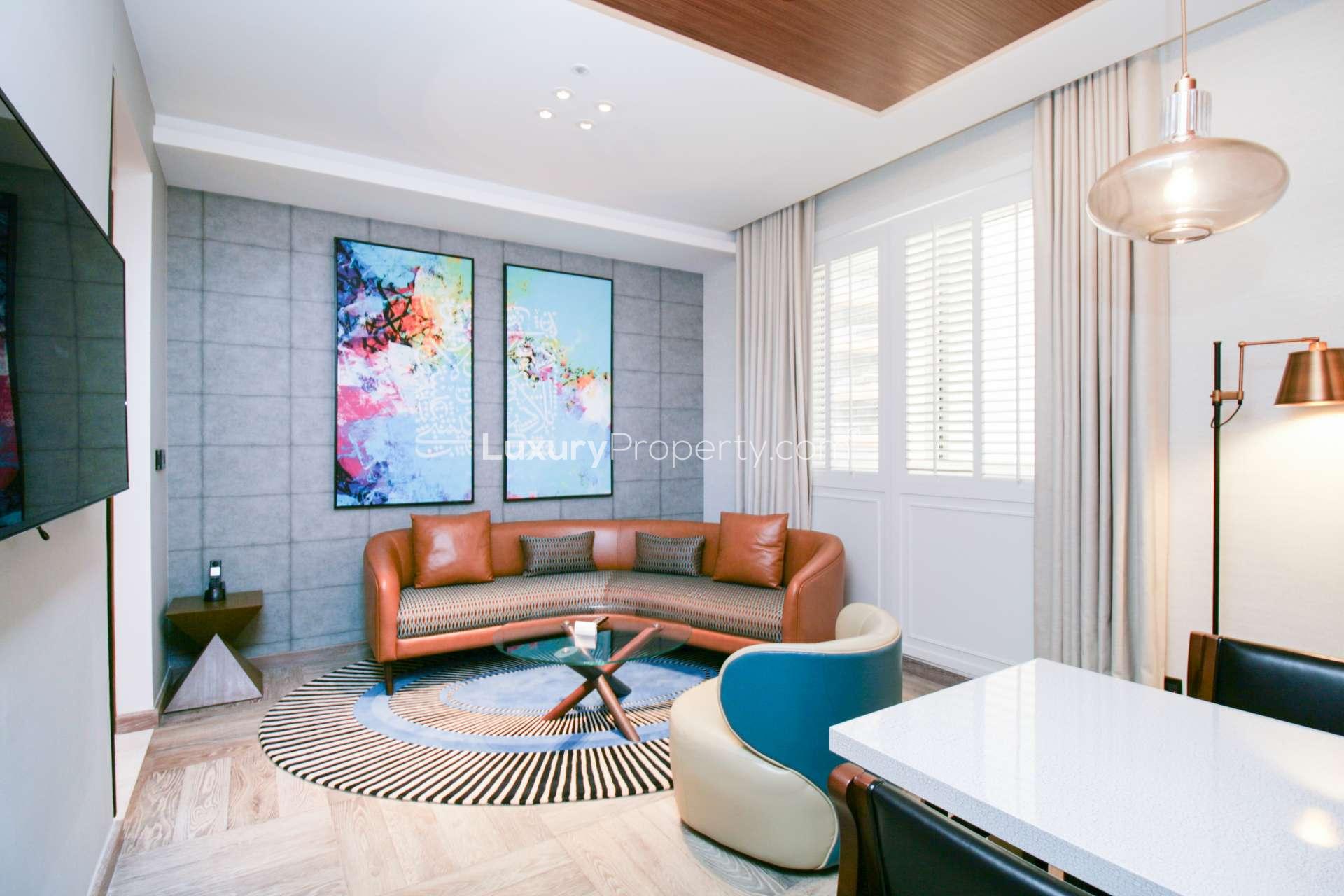 Contemporary studio apartment interior at Andaz, Palm Jumeirah, featuring modern decor and amenities