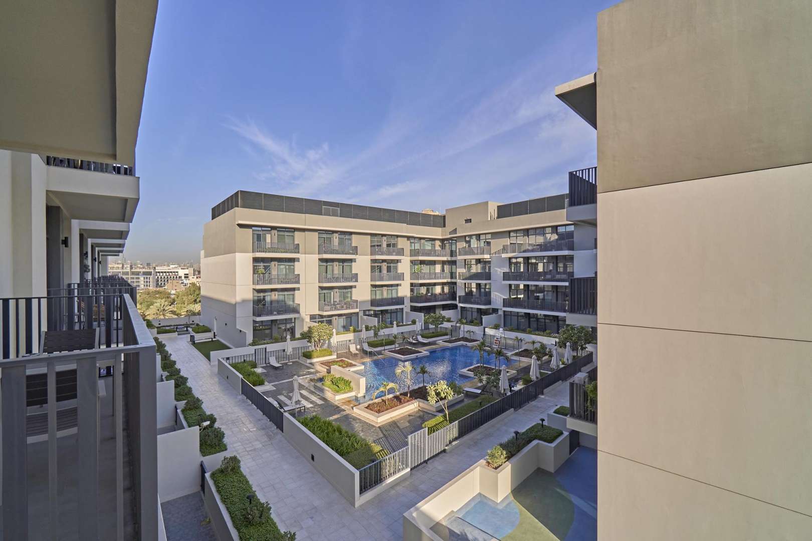 Balcony view of luxury studio apartment in Belgravia 2, Jumeirah Village Circle. Rent available