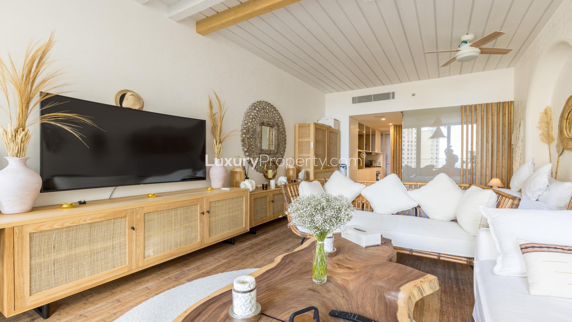 Luxurious studio apartment living area with balcony view in LIV Residence, Dubai Marina