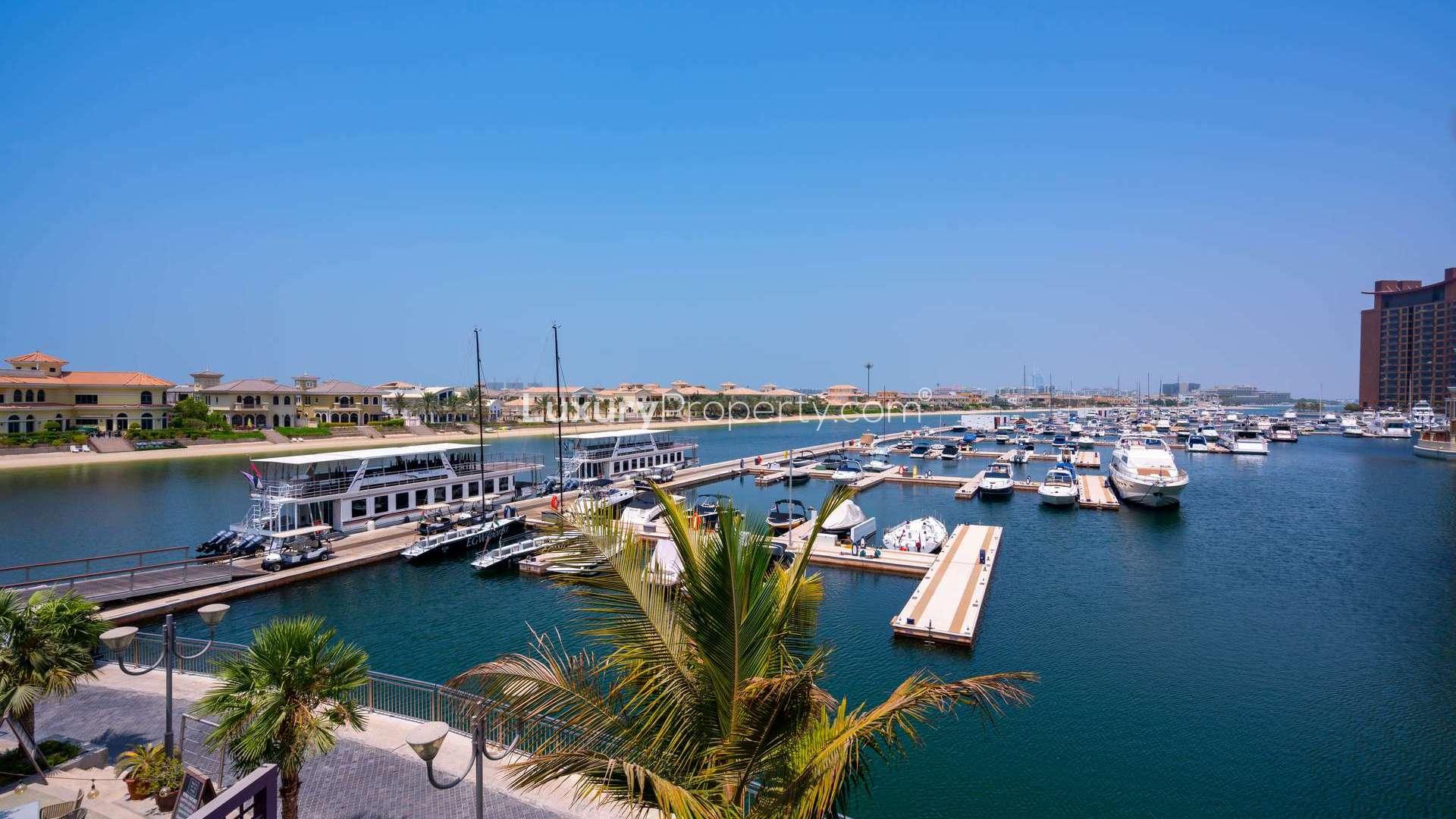 Luxurious studio apartment balcony with marina views on Palm Jumeirah, Palm Views community