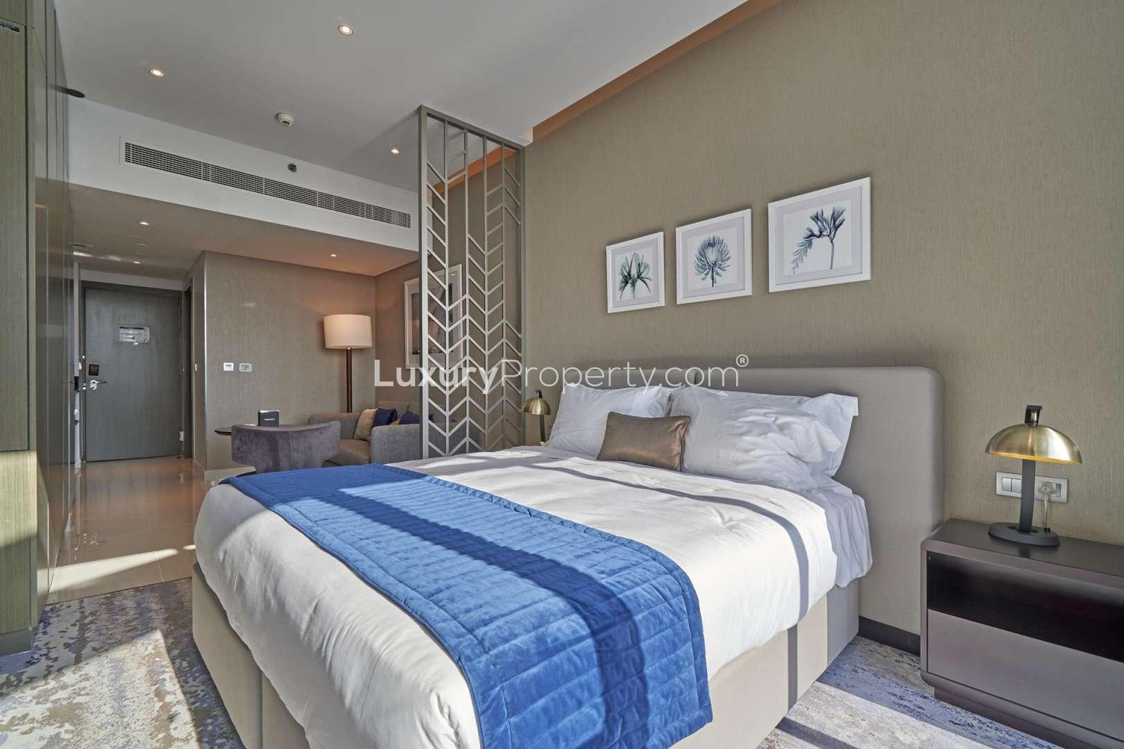 Furnished studio apartment interior in Prive by Damac, Business Bay, featuring modern decor