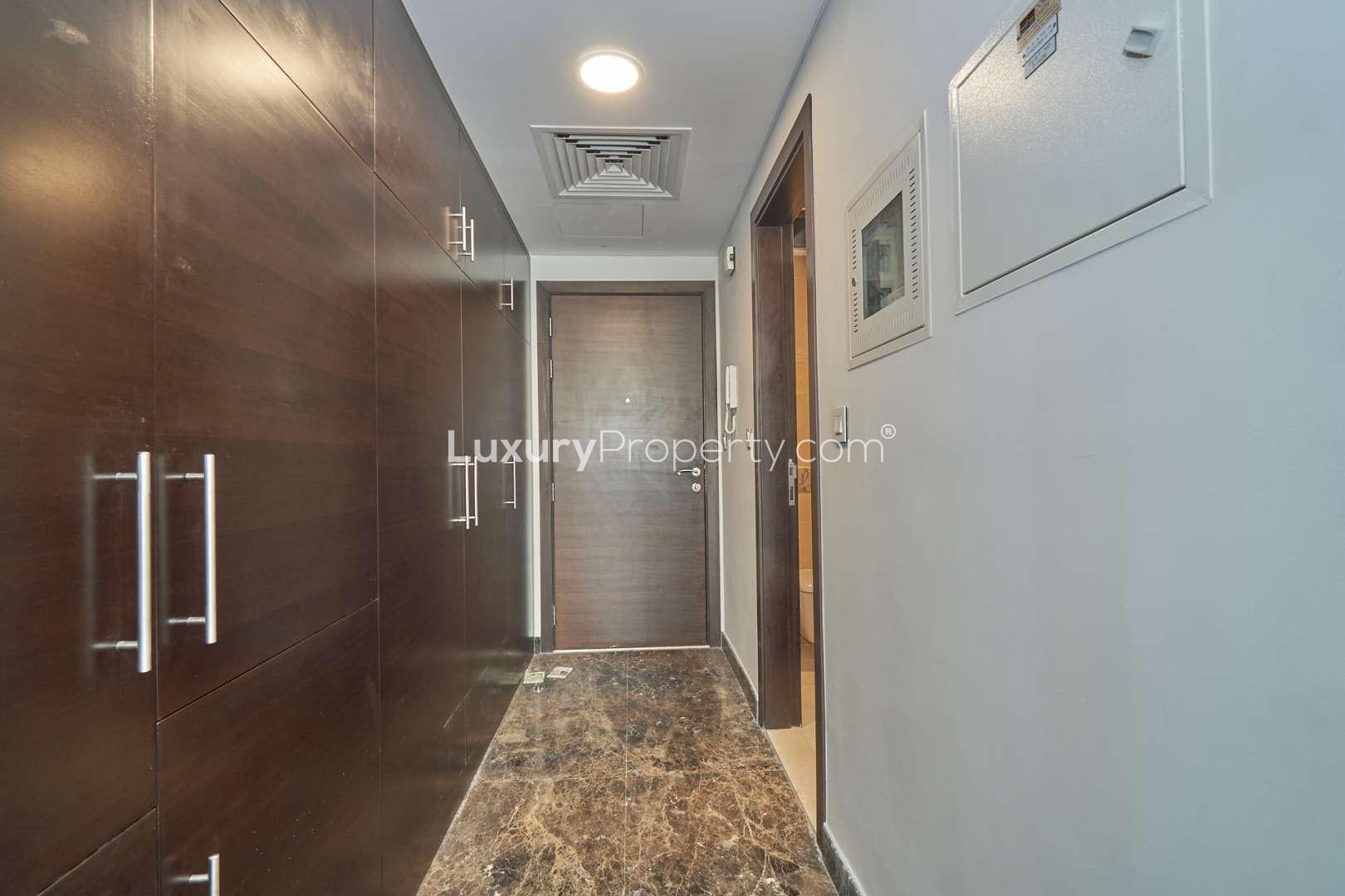 Studio apartment interior with modern kitchen in Sparkle Towers, Dubai Marina