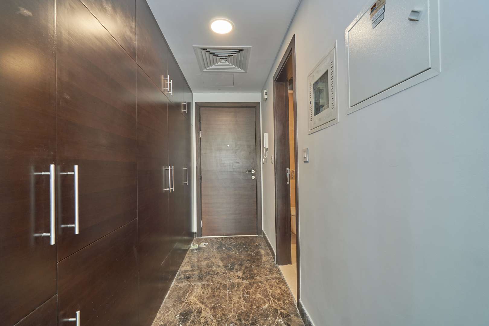 Studio apartment interior with modern kitchen in Sparkle Towers, Dubai Marina