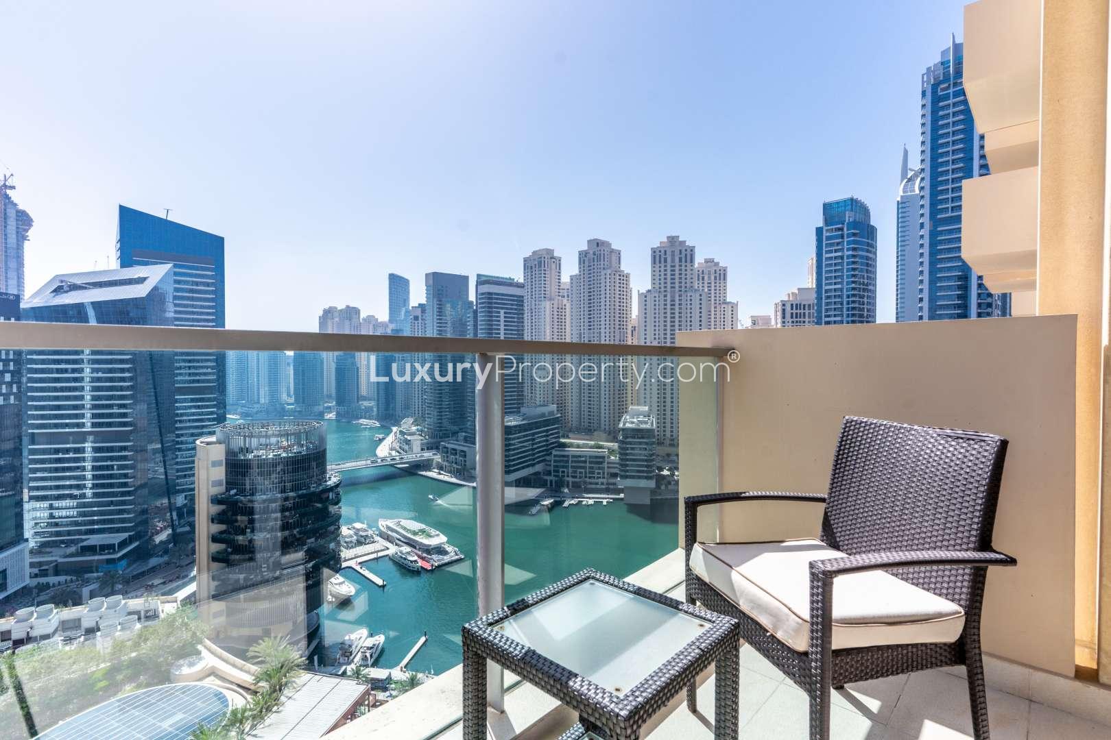 Aerial view of Dubai Marina from The Address, showcasing pool and waterfront skyline