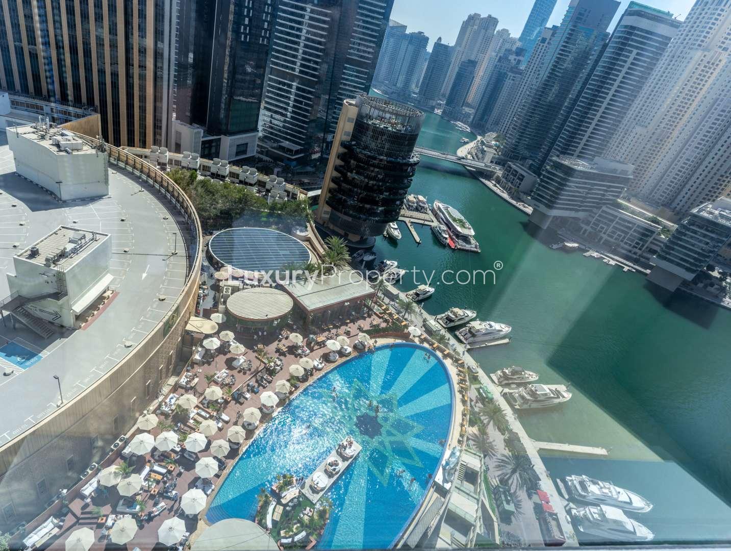 Spacious studio apartment interior with modern furnishings in The Address Dubai Marina