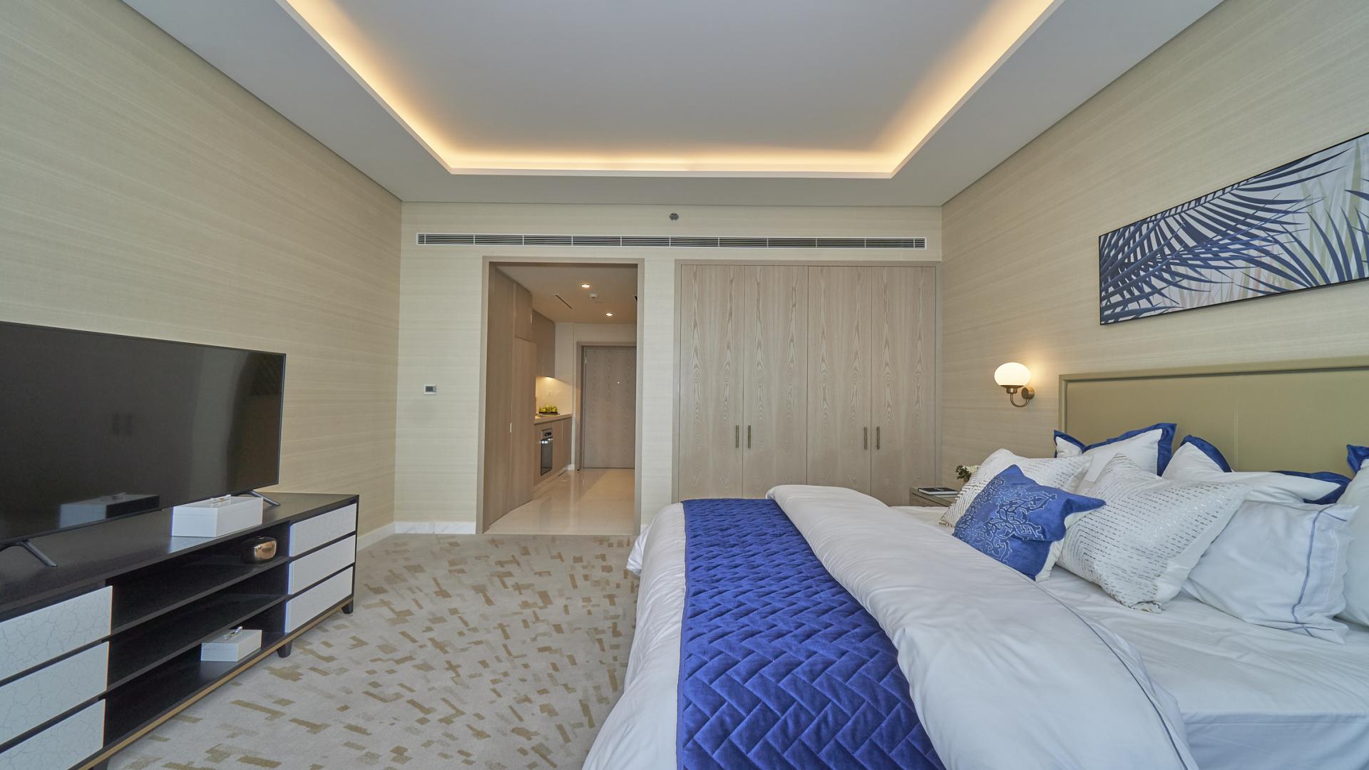 Fully furnished studio in Palm Tower, Palm Jumeirah with modern decor and large window view