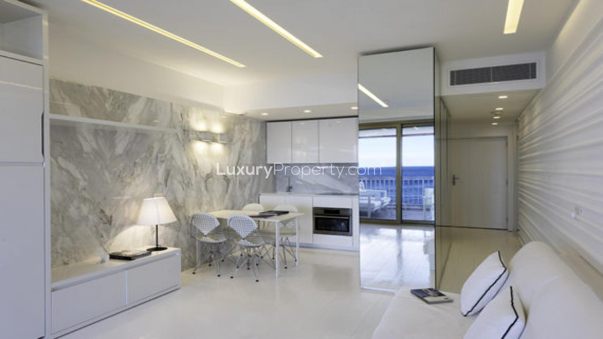 Studio apartment interior with modern decor and ocean view in Monaco Montecarlo Mirabeau