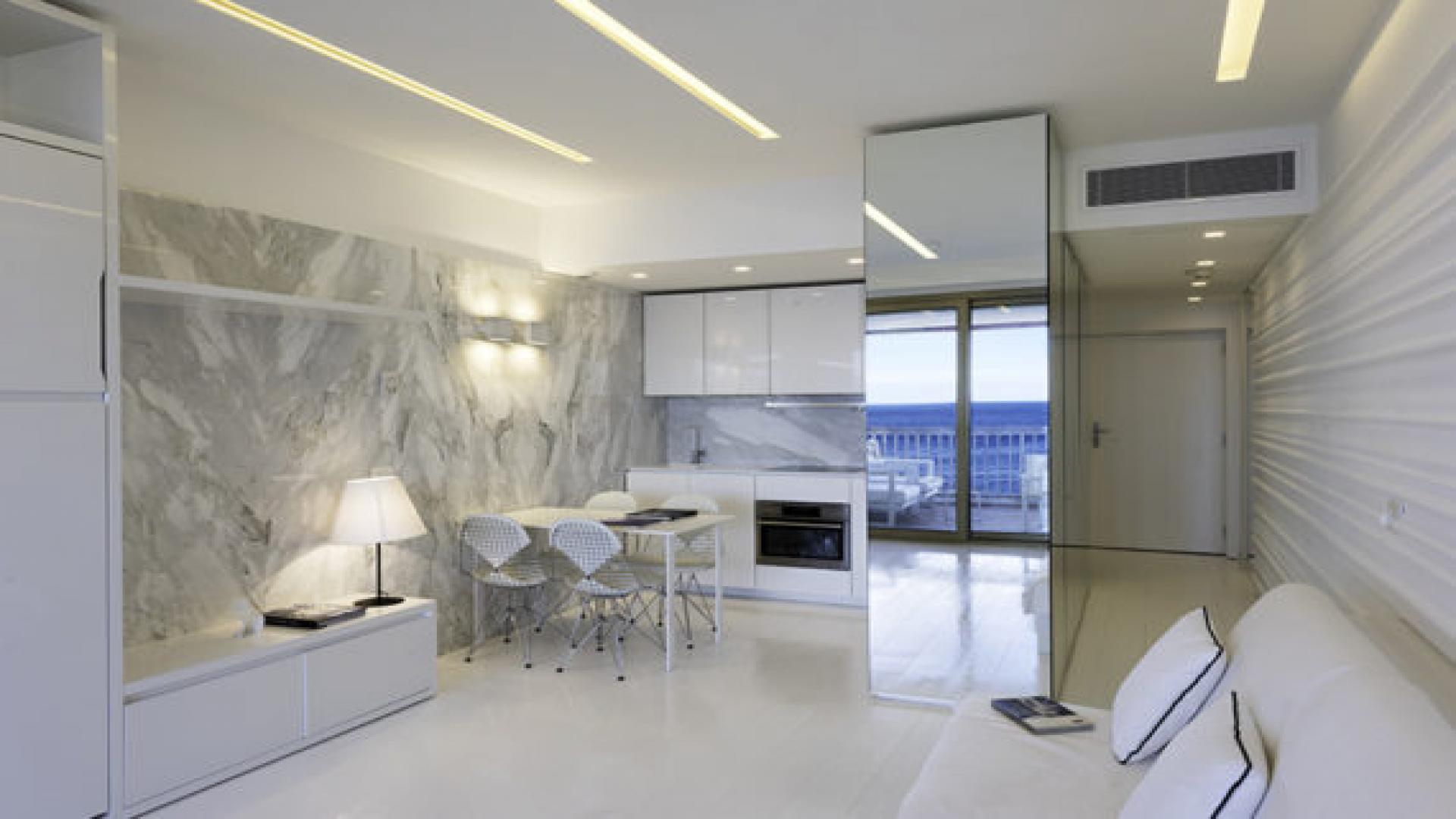 Studio apartment interior with modern decor and ocean view in Monaco Montecarlo Mirabeau