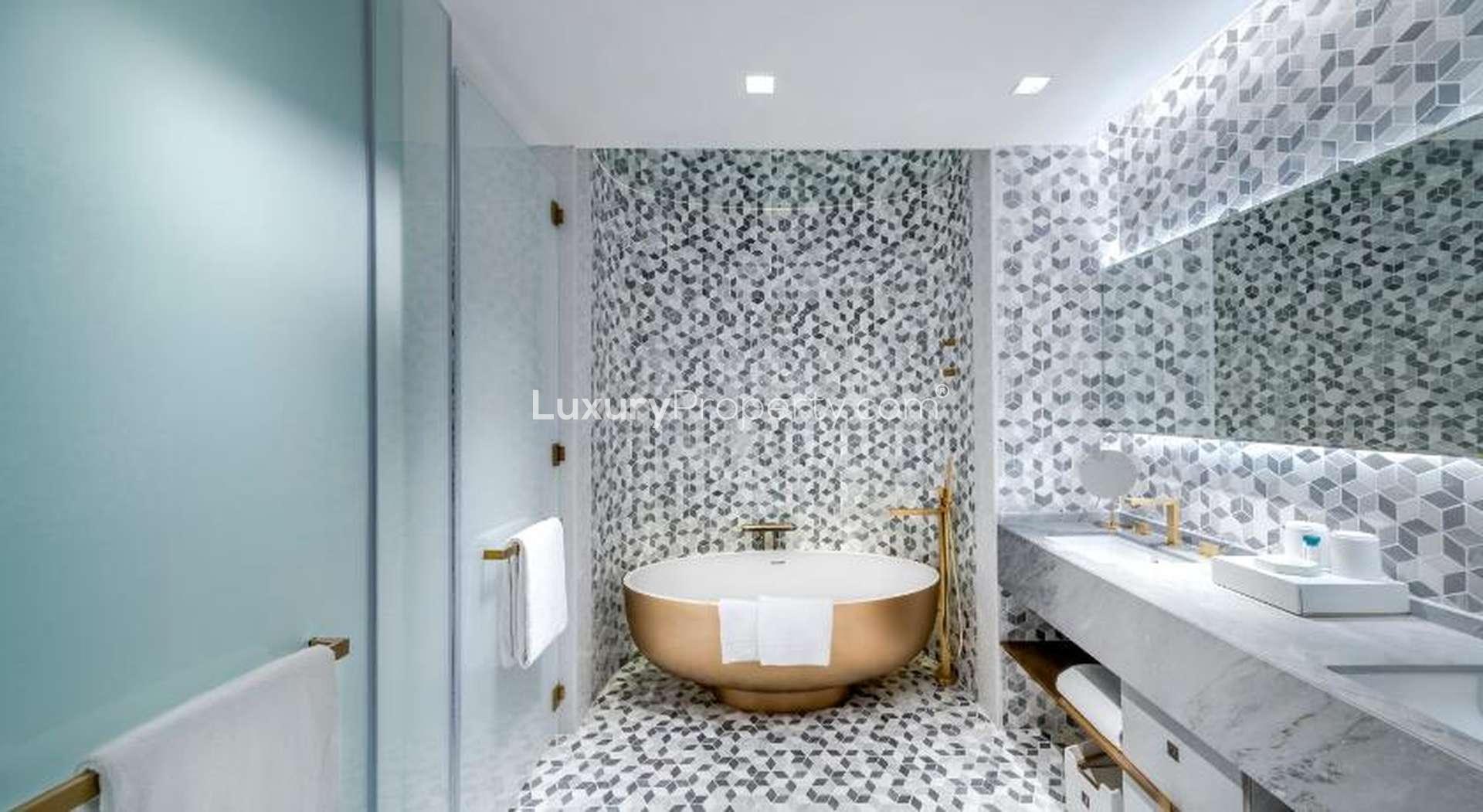 Skyline view from Five Palm Jumeirah studio apartment, showcasing Dubai Marina's stunning architecture