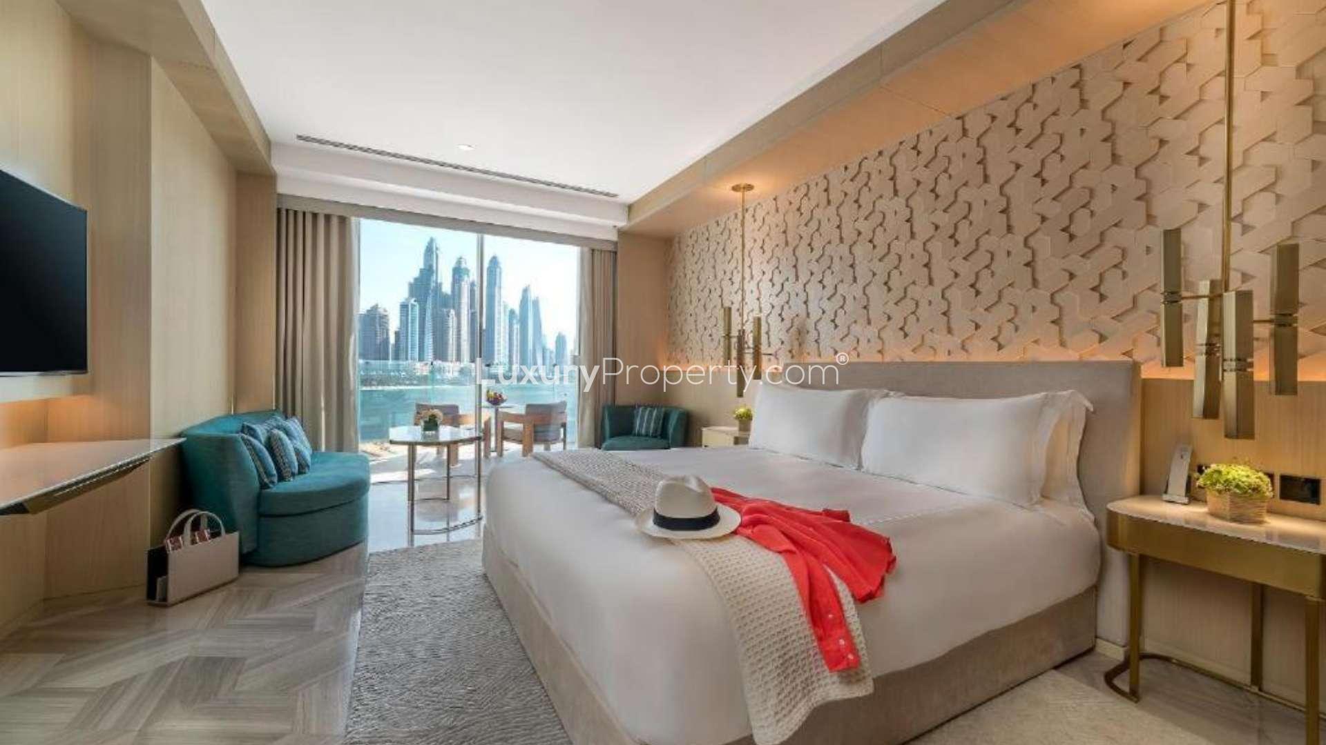 Luxurious studio apartment view, FIVE Palm Jumeirah, overlooking beach and skyline