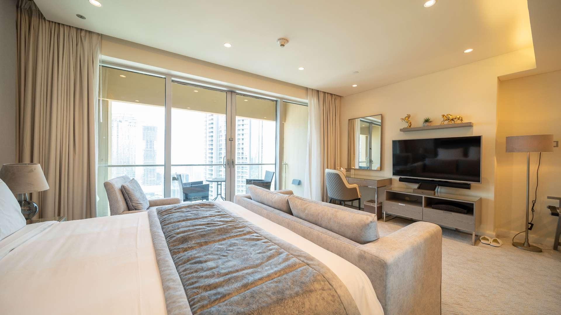 Fully renovated luxury studio kitchen and living area in The Address Dubai Mall apartment