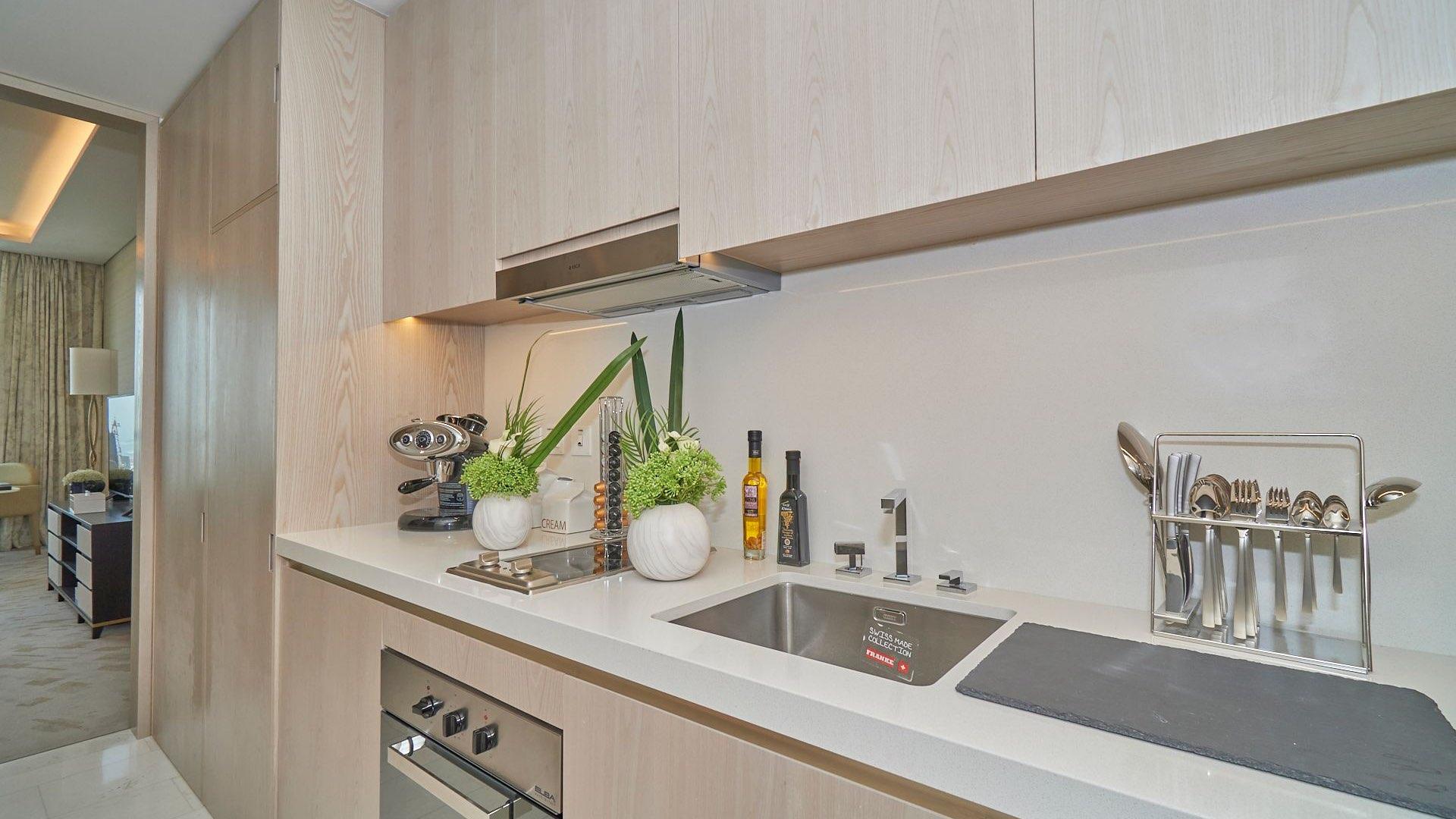 Studio apartment interior at The Palm Tower, Palm Jumeirah, facing Burj Al Arab