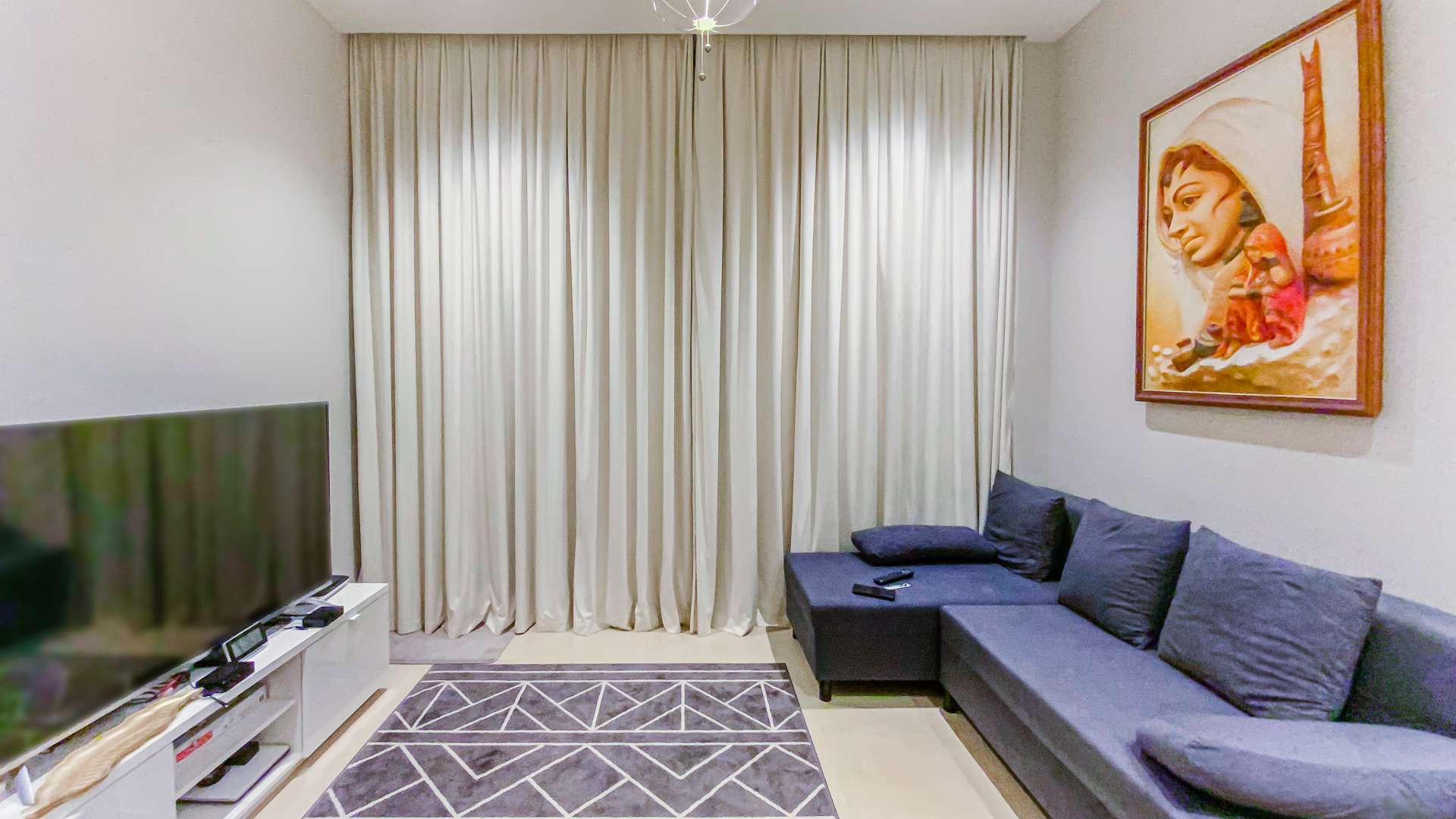 Furnished studio apartment interior at Marina Gate, Dubai Marina with modern decor and cozy layout