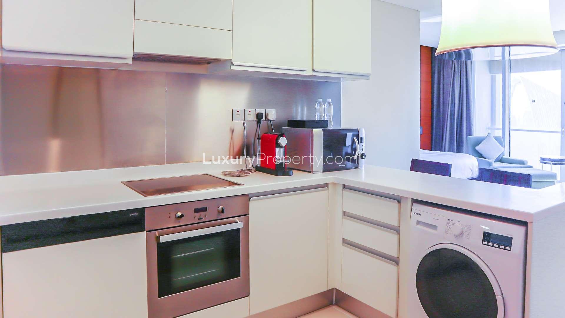 Furnished studio apartment interior at The Address Dubai Mall, Downtown Dubai, for rent