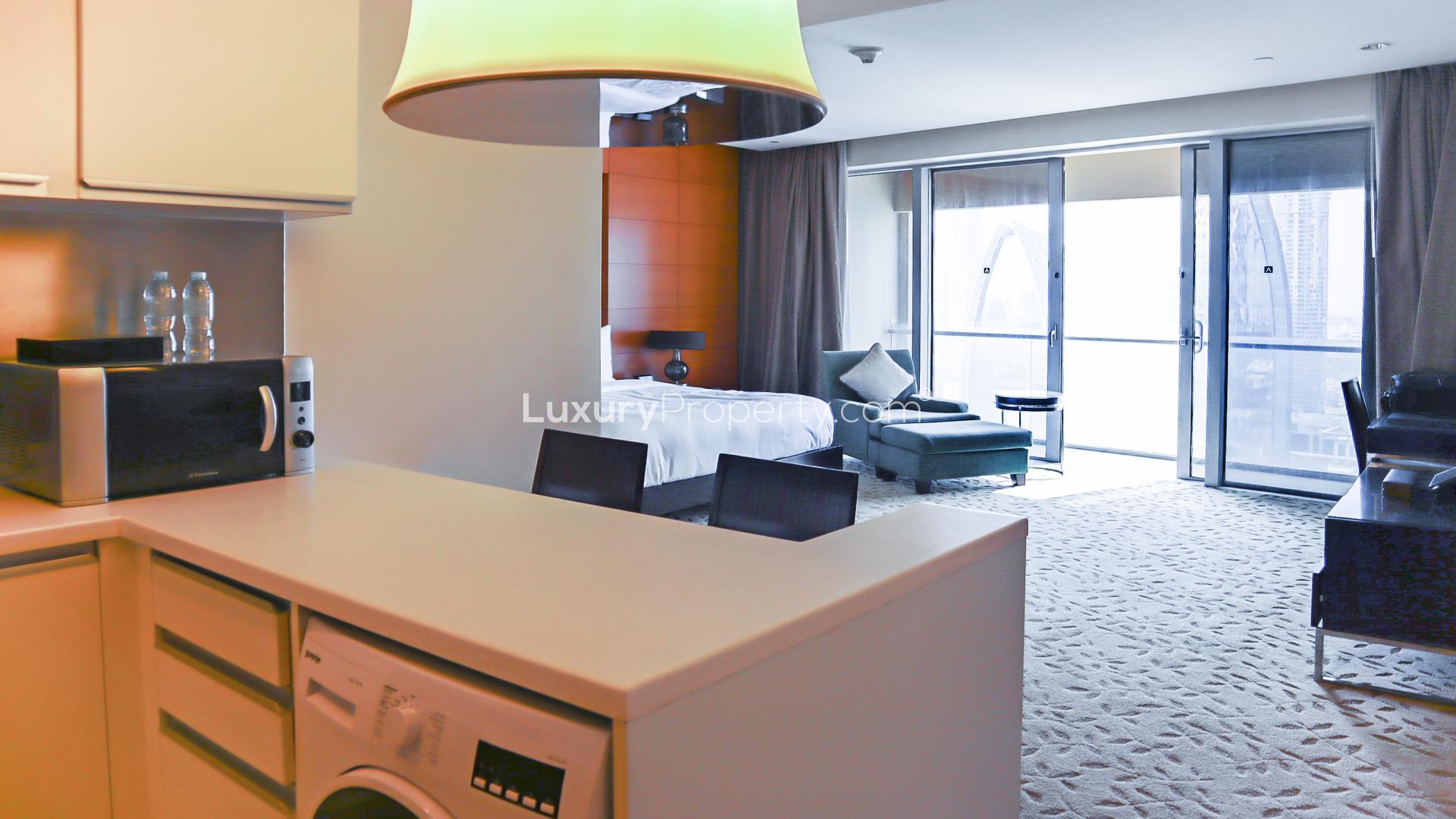 Modern kitchen in studio apartment at The Address Dubai Mall, Downtown Dubai for rent