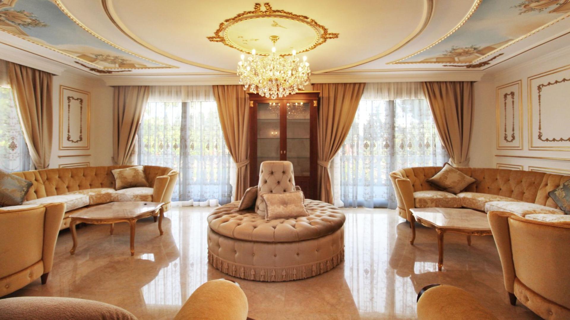 Luxurious living room in 8-bedroom villa, Guadalmina Baja, Spain, with elegant furniture and decor