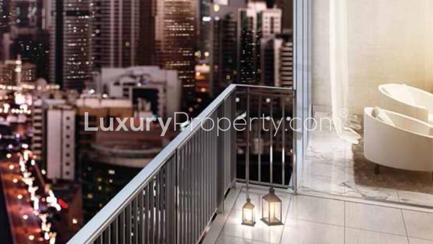 Studio apartment interior with modern decor and city view at 52|42, Dubai Marina
