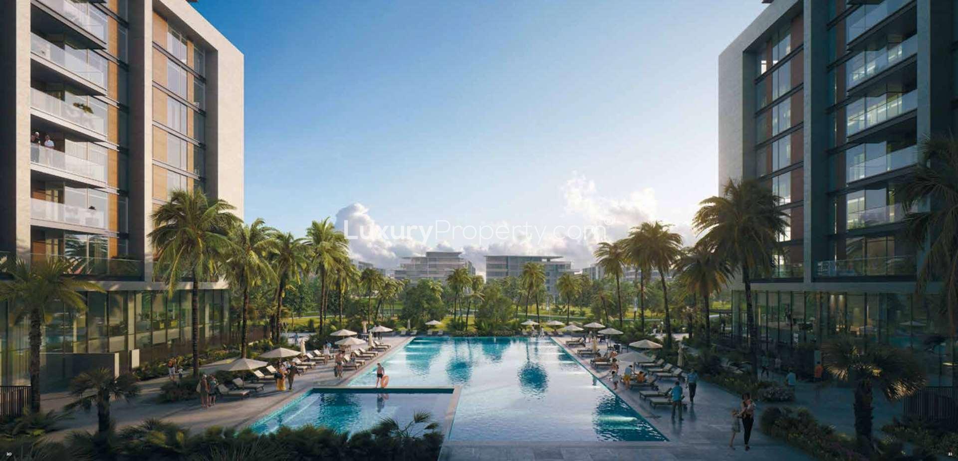 Acacia Park Heights luxury apartment complex in Dubai Hills Estate with pool view at dusk