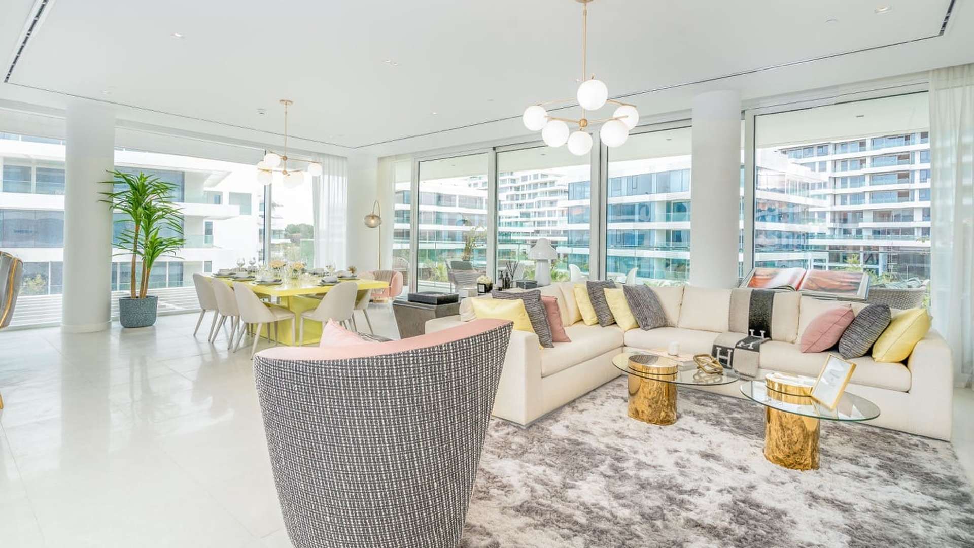 "Spacious walk-in closet in Ashjar at Al Barari studio apartment for sale, LP0369.",Modern studio apartment interior at Ashjar, Al Barari with elegant furnishings and large windows