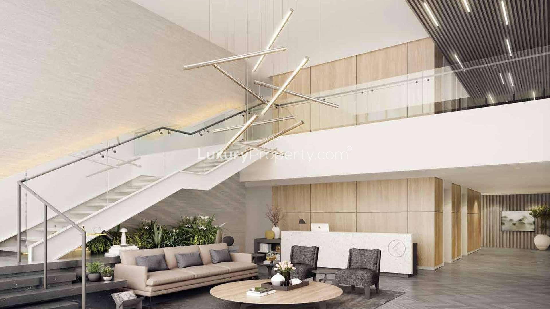 Outdoor pool view at Belgravia Square, Jumeirah Village Circle apartment complex for sale