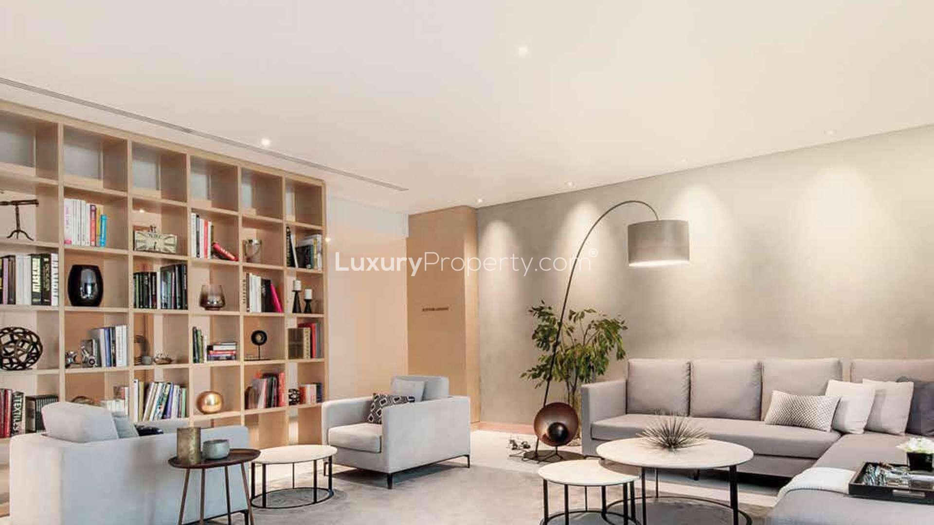 Modern lobby in Belgravia Square apartment, Jumeirah Village Circle, with stylish decor and seating