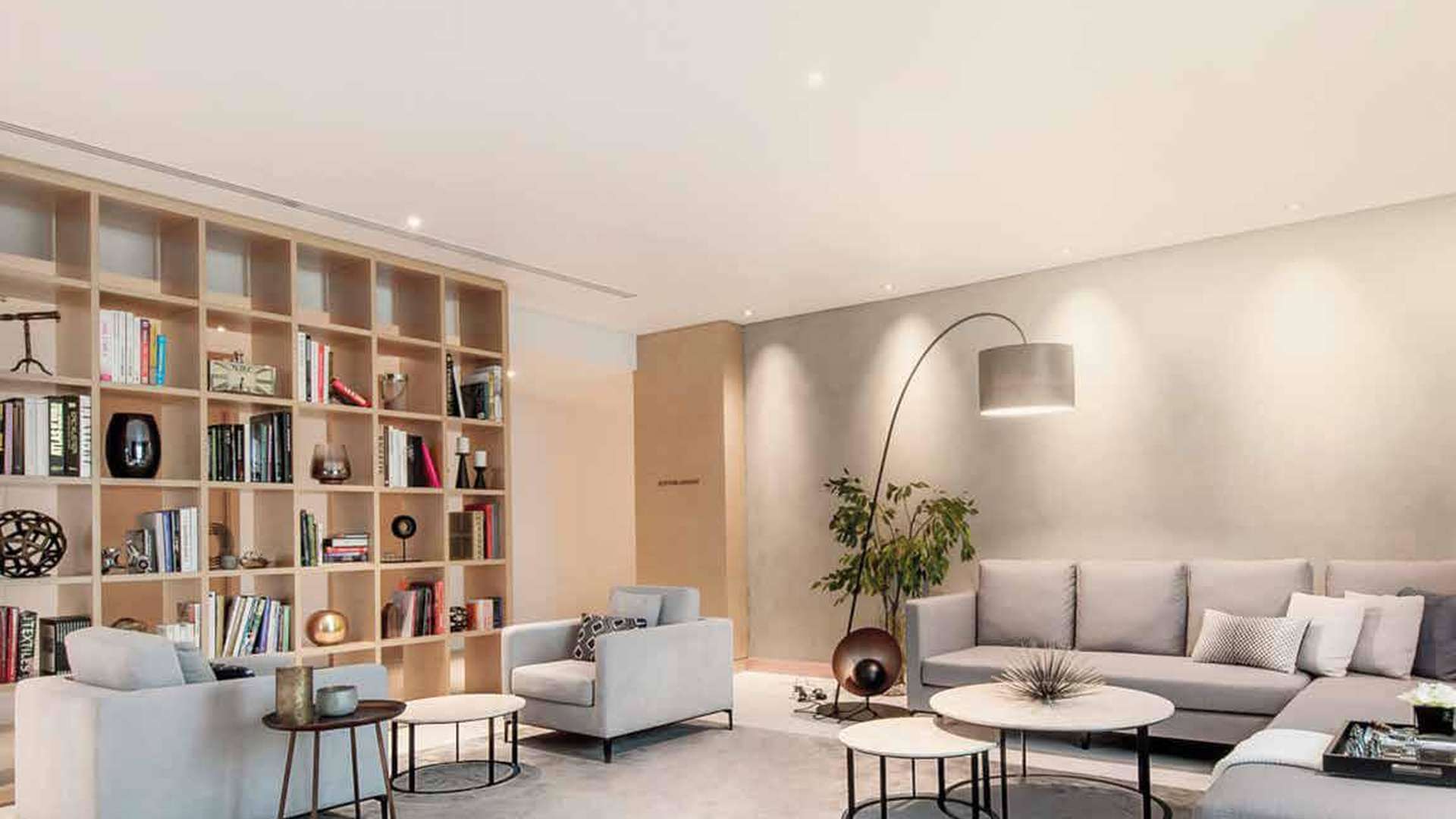 Modern lobby in Belgravia Square apartment, Jumeirah Village Circle, with stylish decor and seating