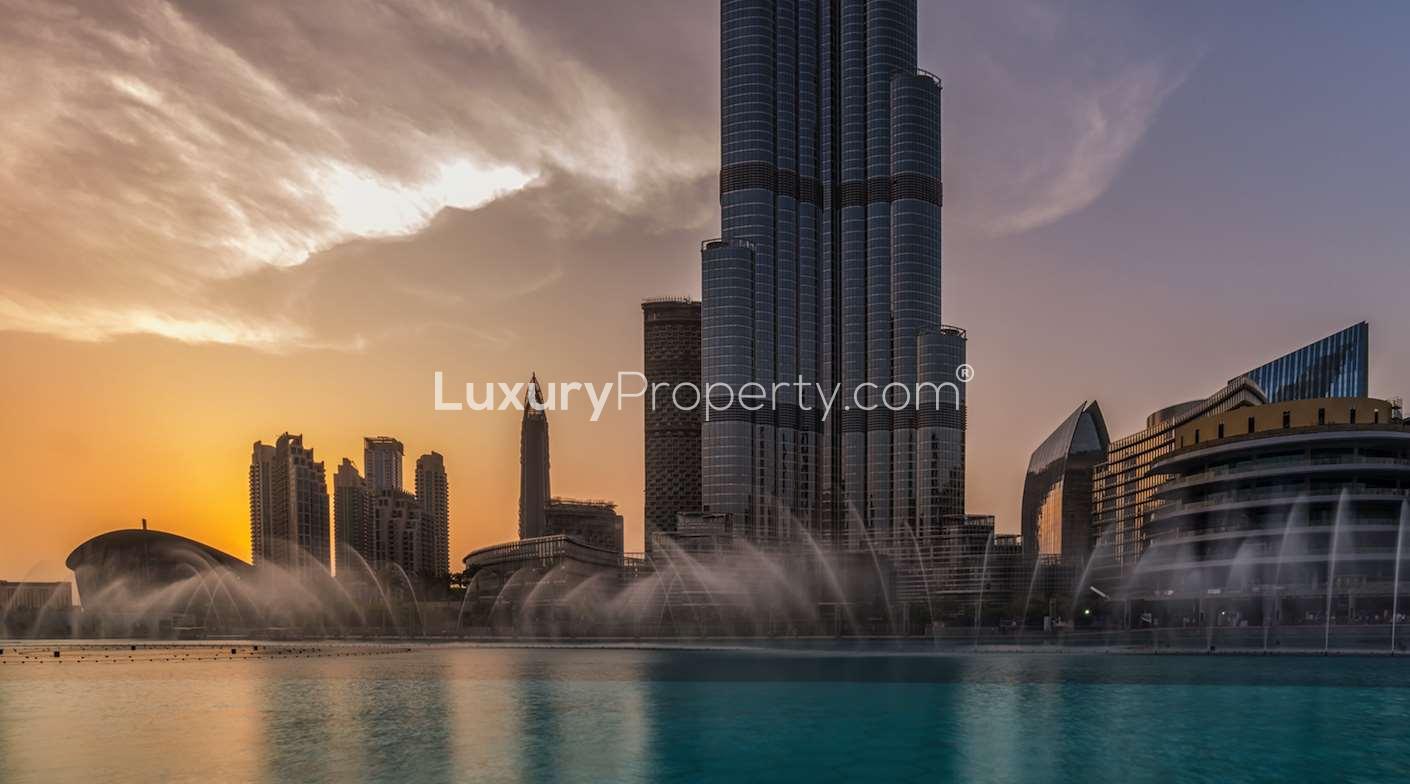 BLVD Heights apartment towers in Downtown Dubai, elegant cityscape view at dusk