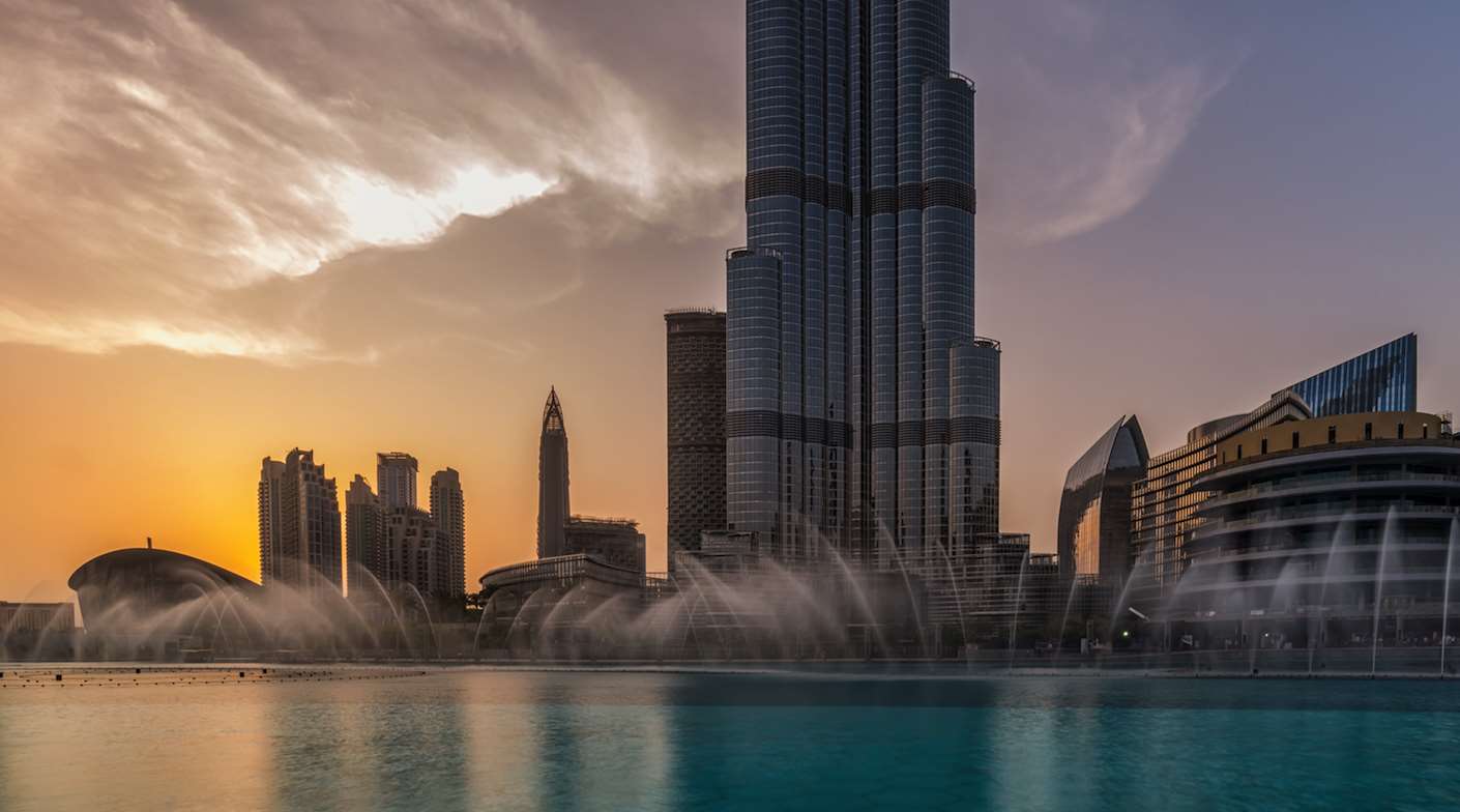 BLVD Heights apartment towers in Downtown Dubai, elegant cityscape view at dusk