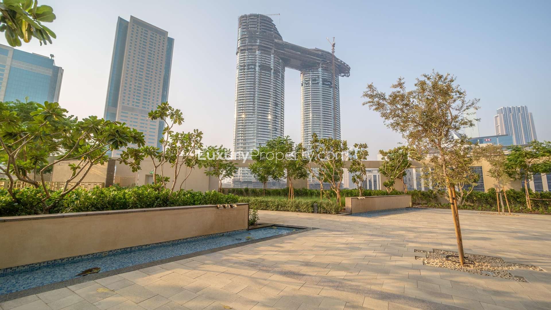 Outdoor pool with Burj Vista apartment view in Downtown Dubai, Burj Khalifa visible