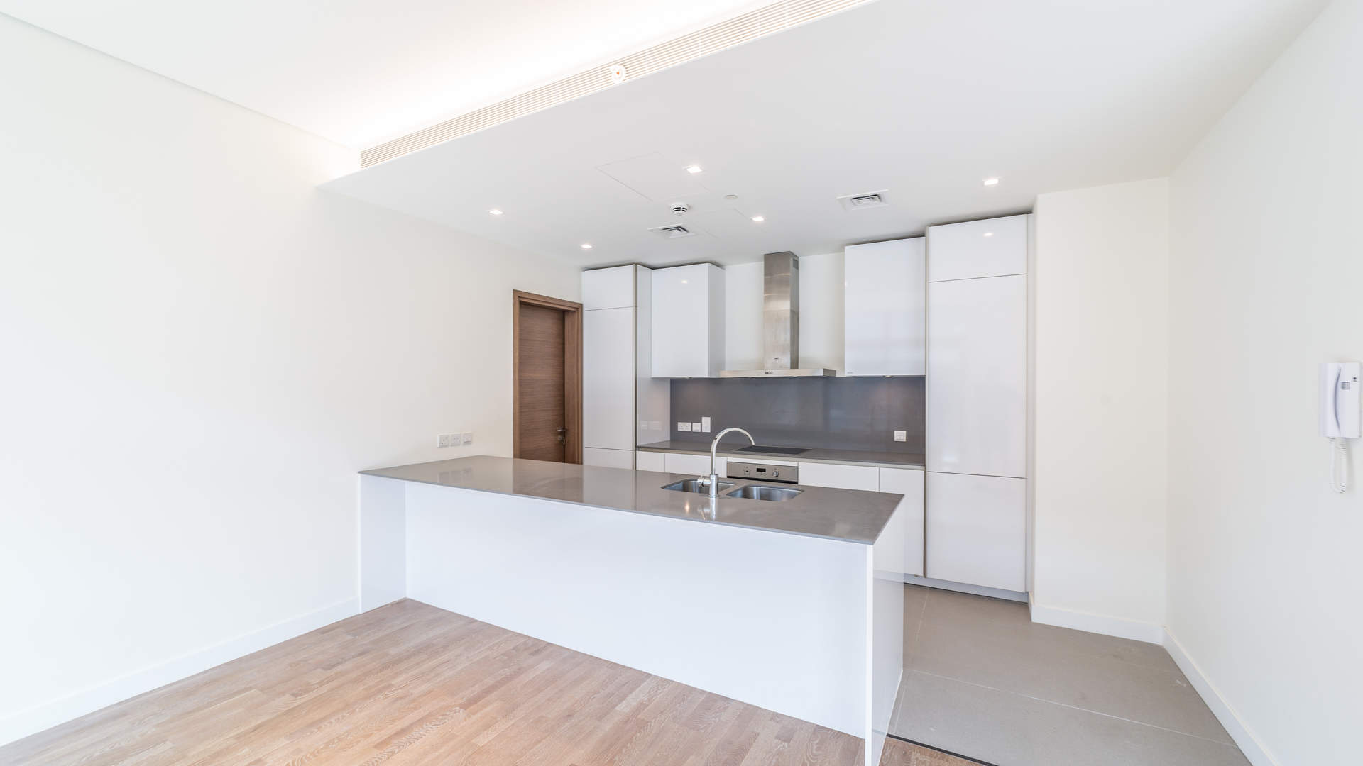 "Spacious balcony view of modern City Walk apartment for sale in Jumeirah by Meraas.",Ultramodern kitchen in luxury studio apartment at City Walk, Jumeirah, for sale