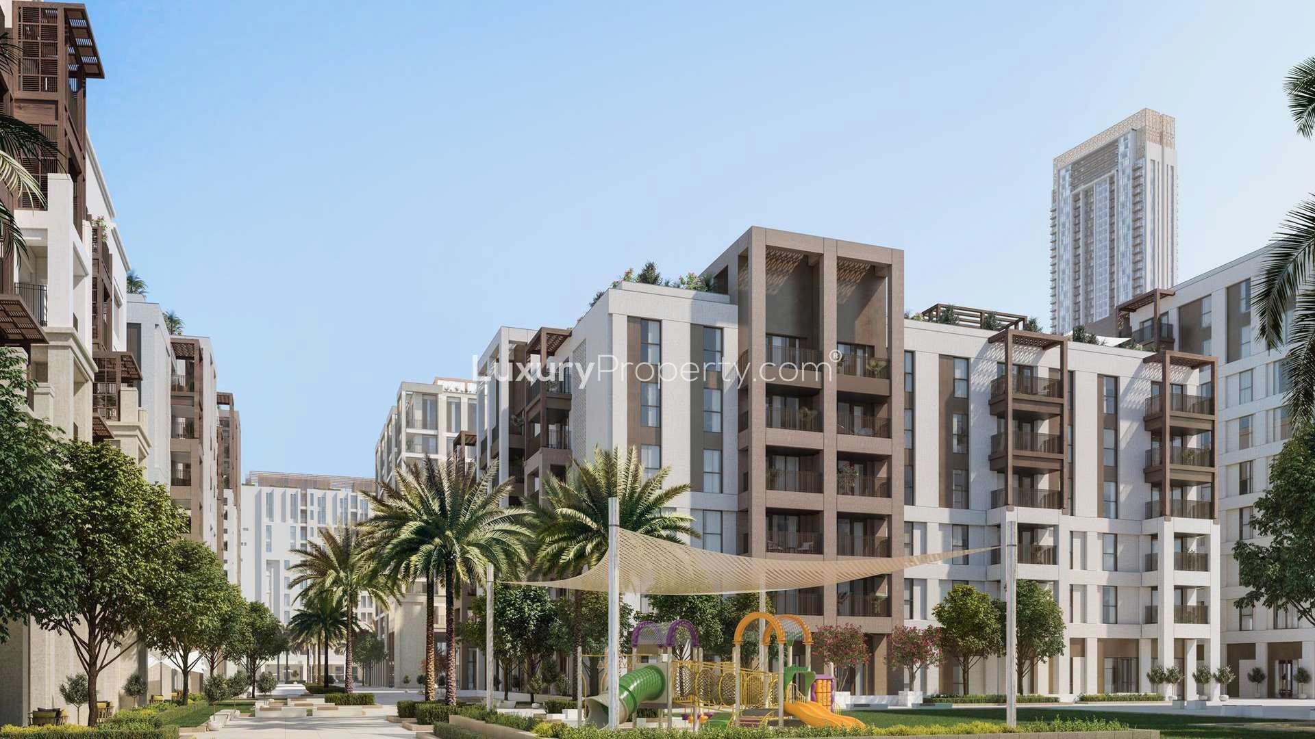 Modern studio apartments in Lotus, Creek Beach, Dubai Creek Harbour, surrounded by lush greenery