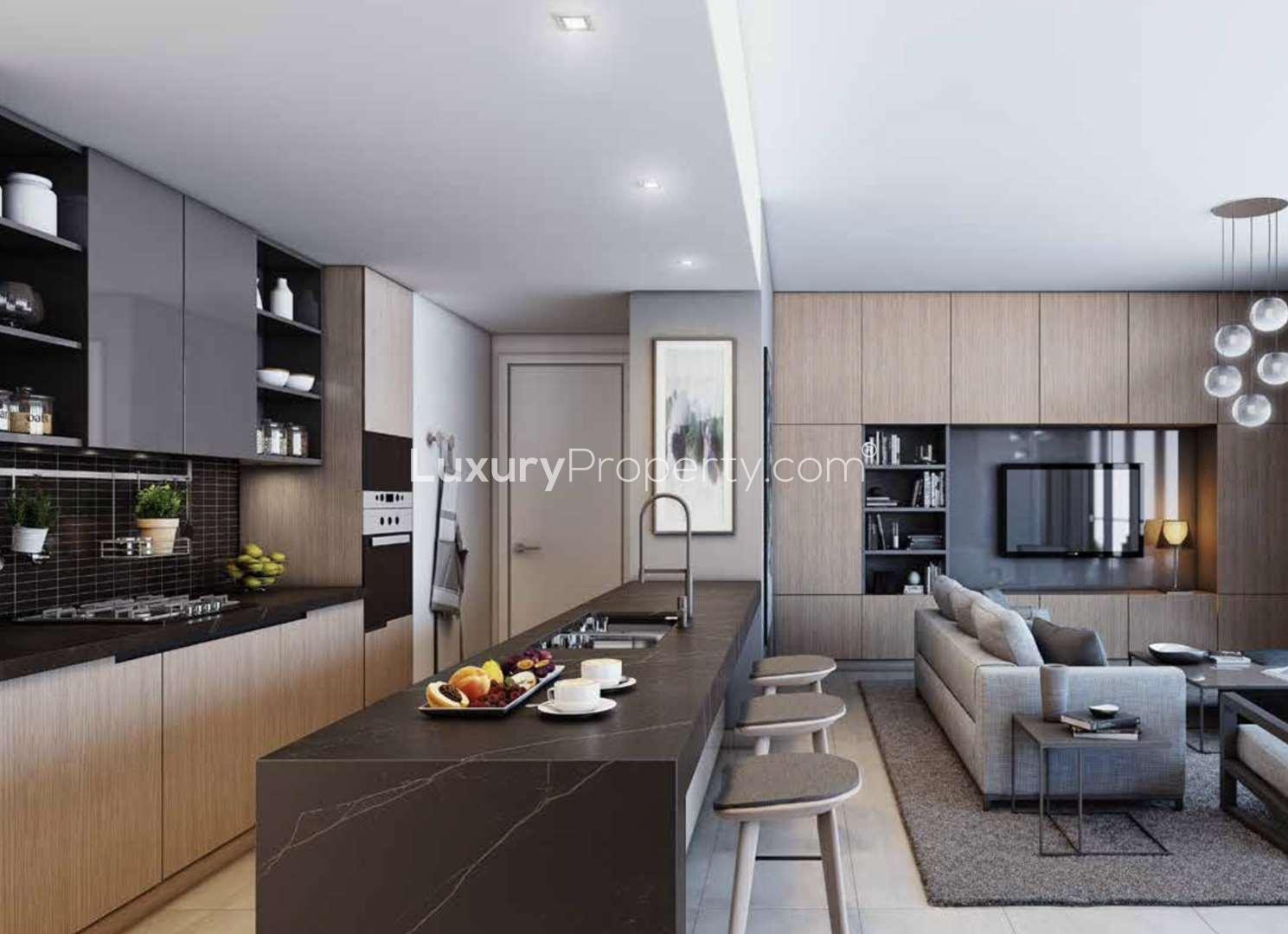 Contemporary studio apartment interior with modern kitchen and living area in Downtown Dubai's DT1