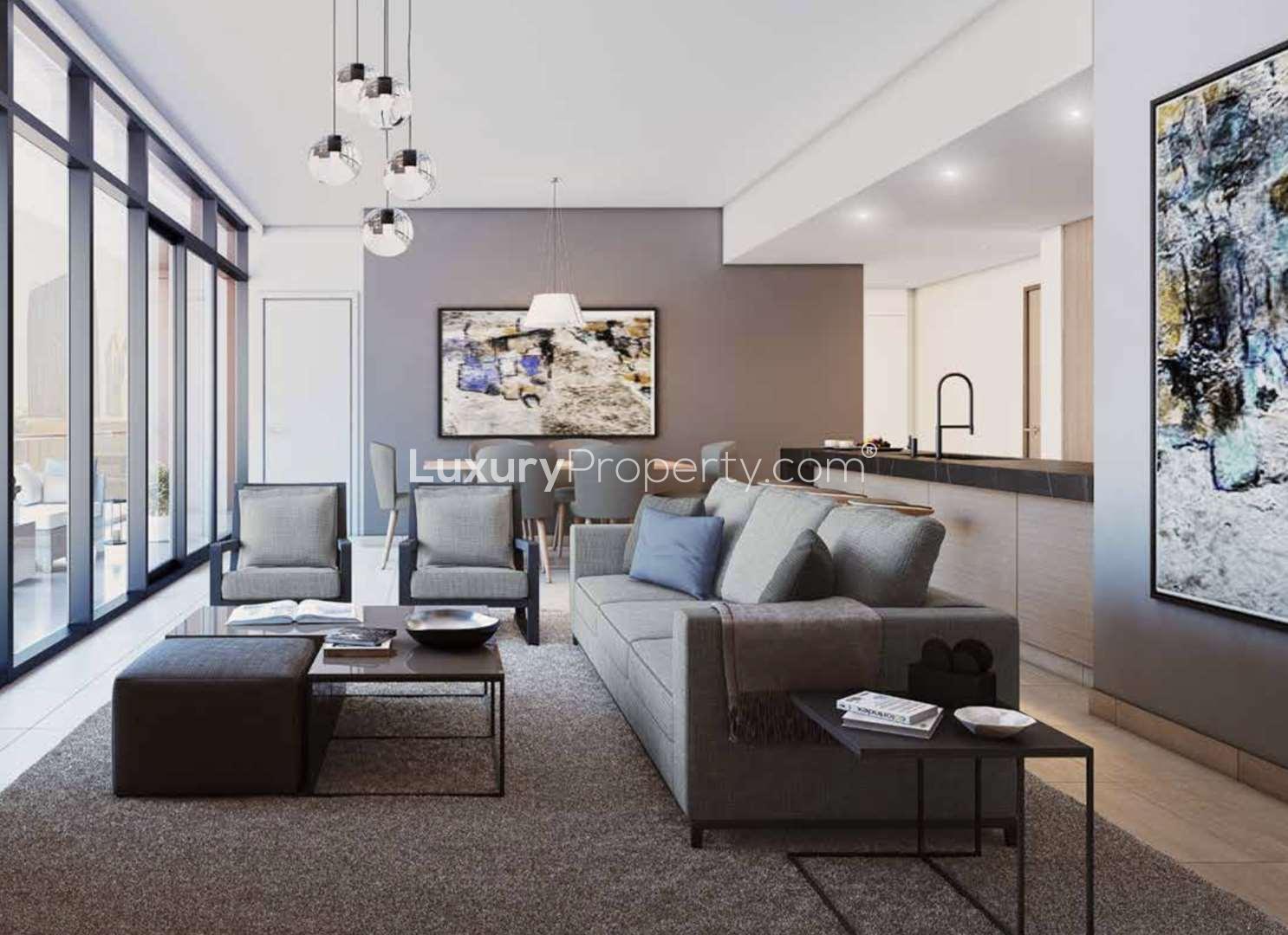 "Modern studio apartment interior with city view at DT1, Downtown Dubai, for sale.",Contemporary studio apartment living room in DT1, Downtown Dubai, with modern furnishings